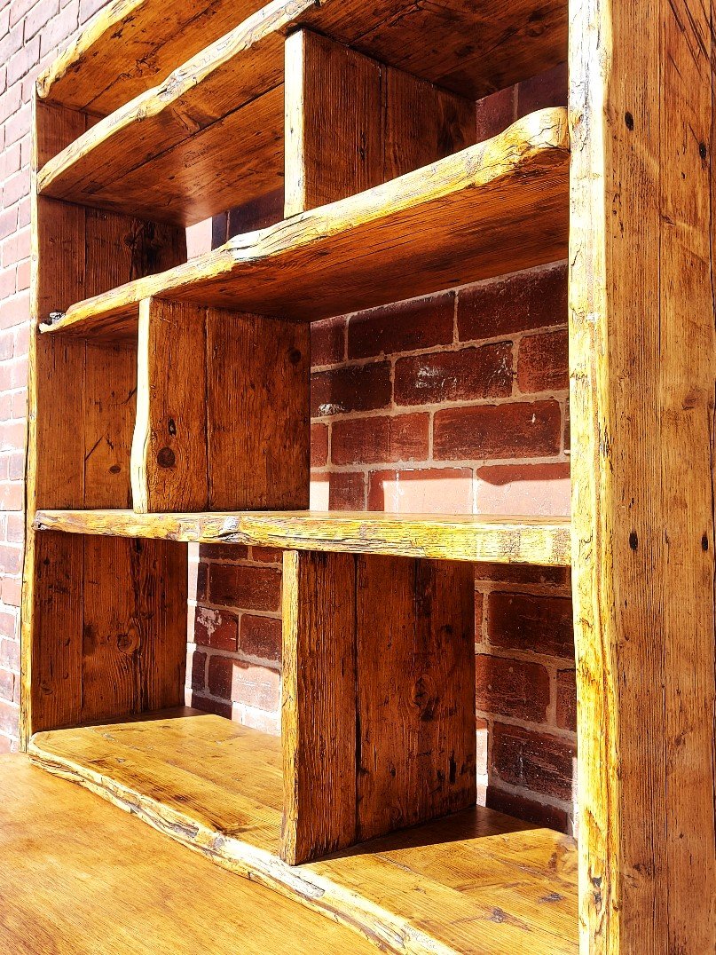 Large bookcase on red brick wall
Brown-Reclaimed-Sheffield-
Handmade-Bespoke-Shelving-Unit- Reclaimed-Wood