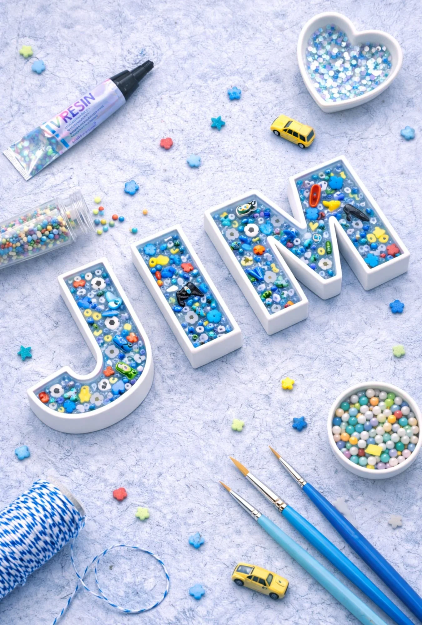 white 3d printed letters showing kids name jim
