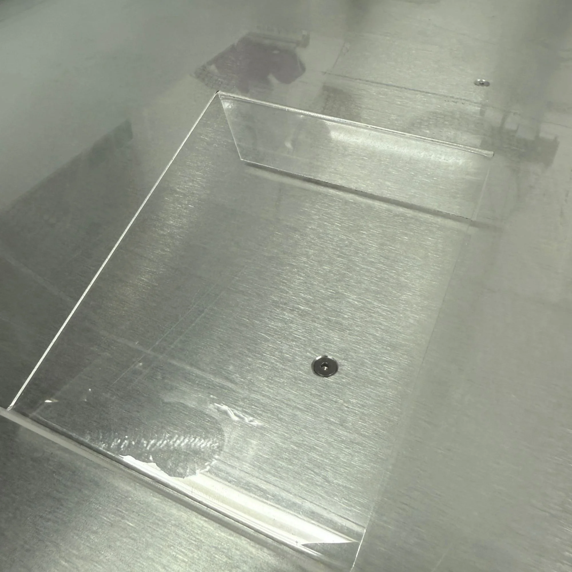 Acrylic letter holder on a glass table