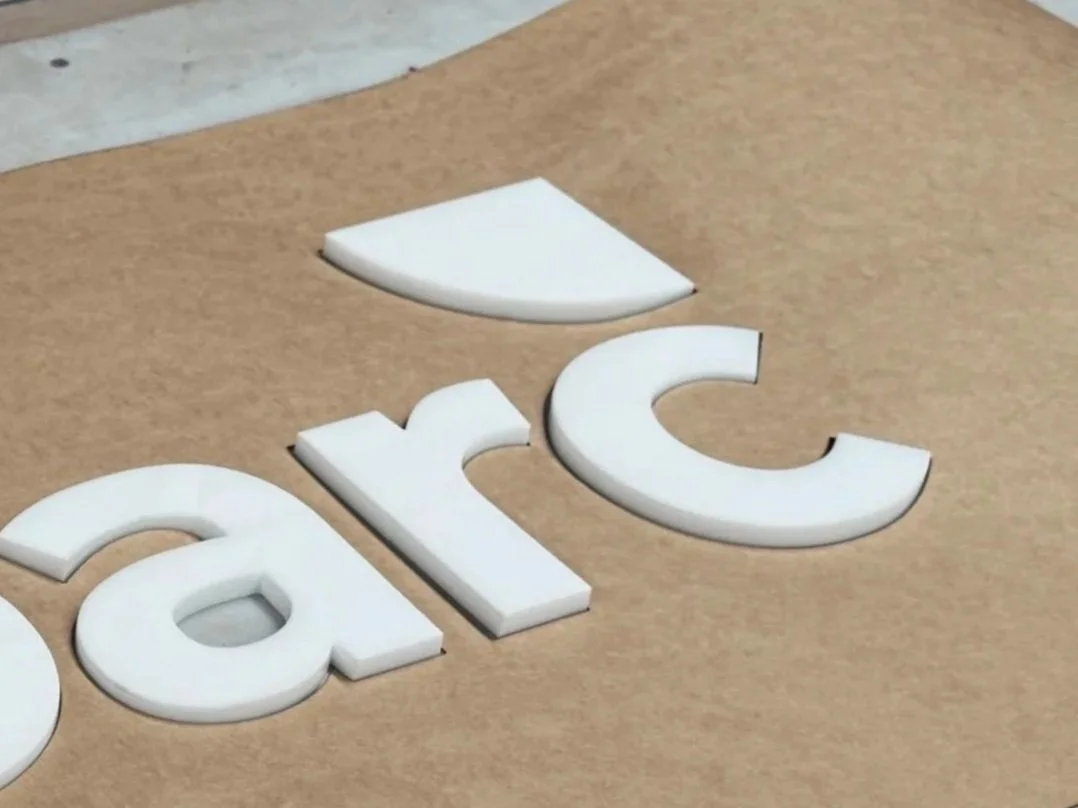 White acrylic sign in paper template ready for install