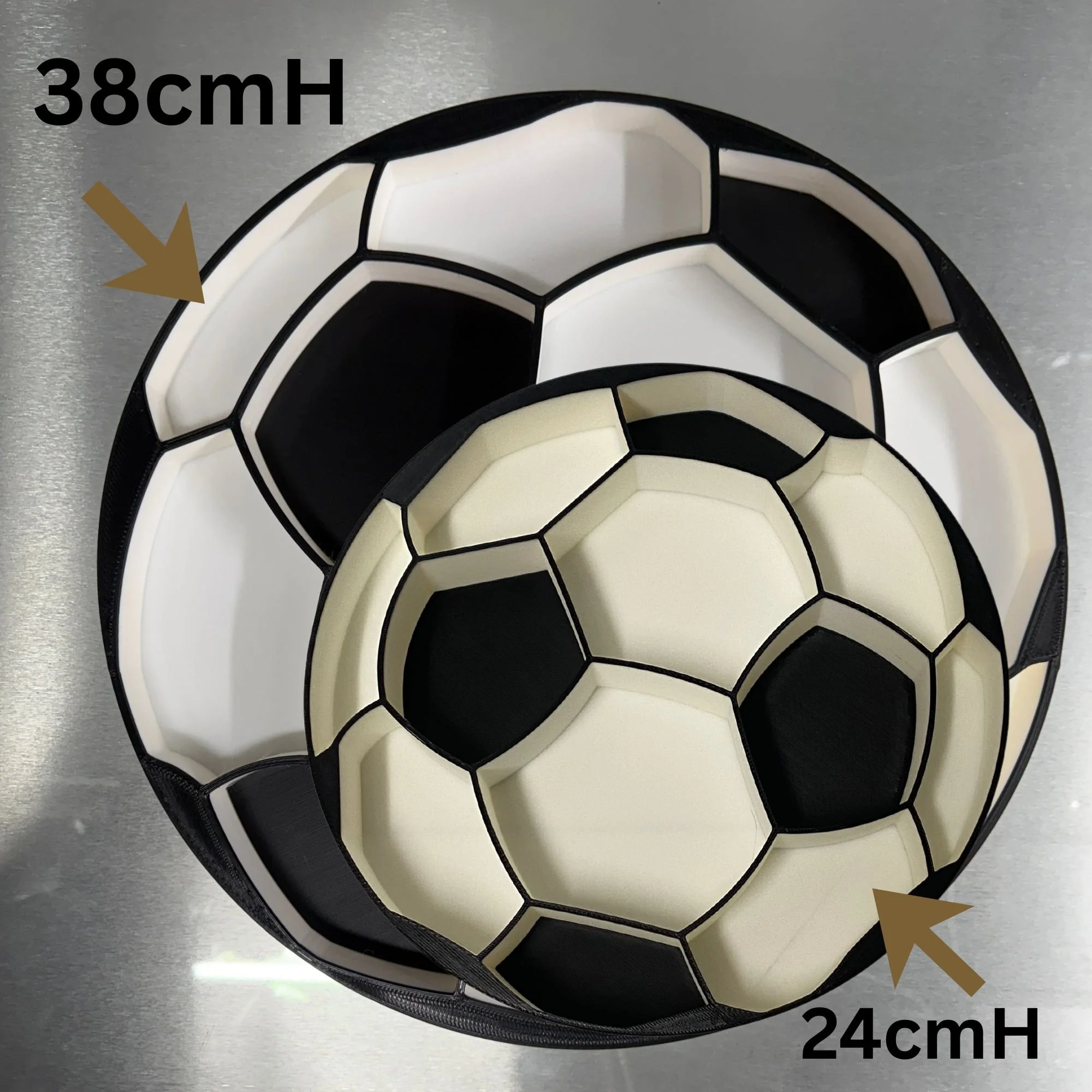 2 soccer ball fillable trays comparing sizes