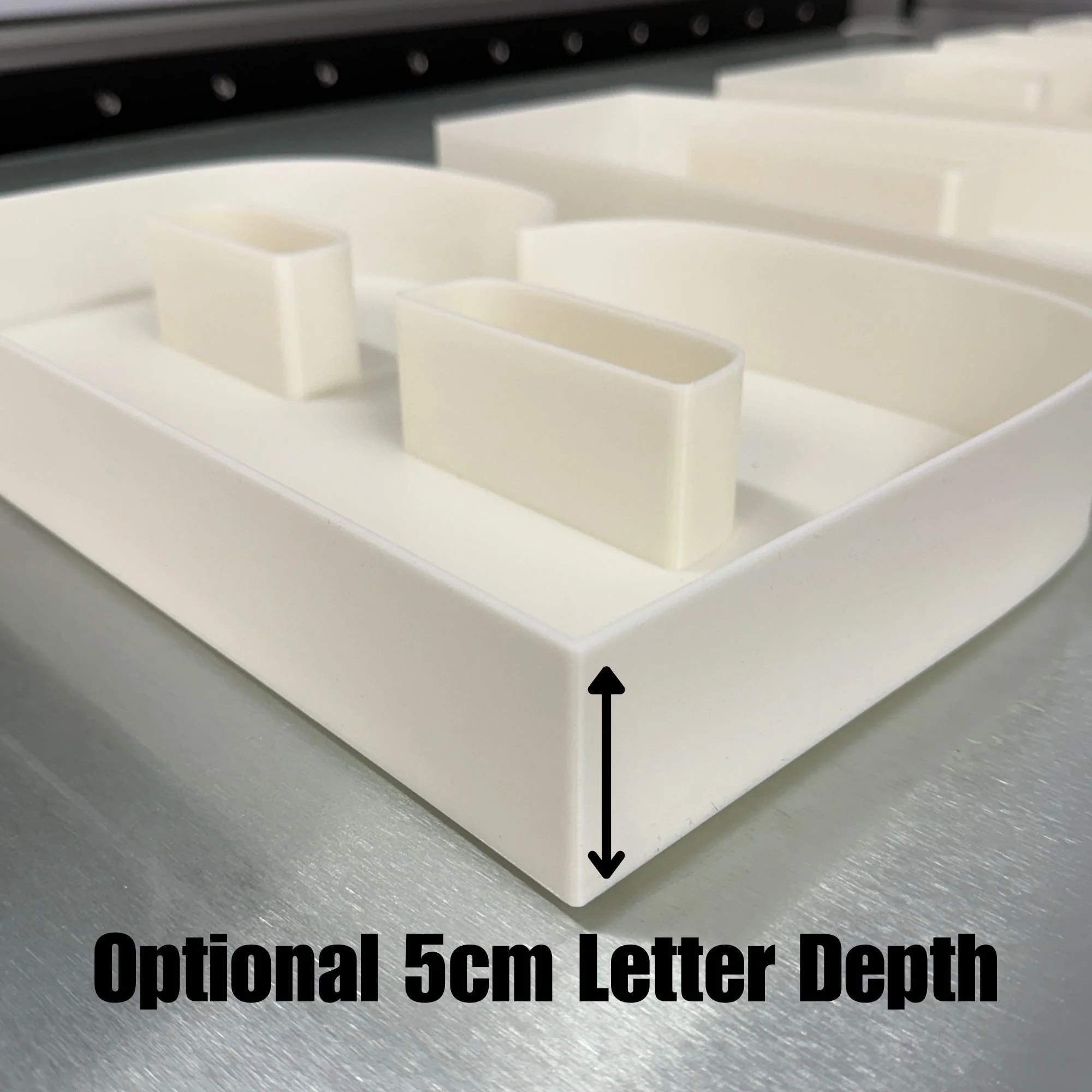 Letter B and text showing 5cmh letter depth fillable food tray