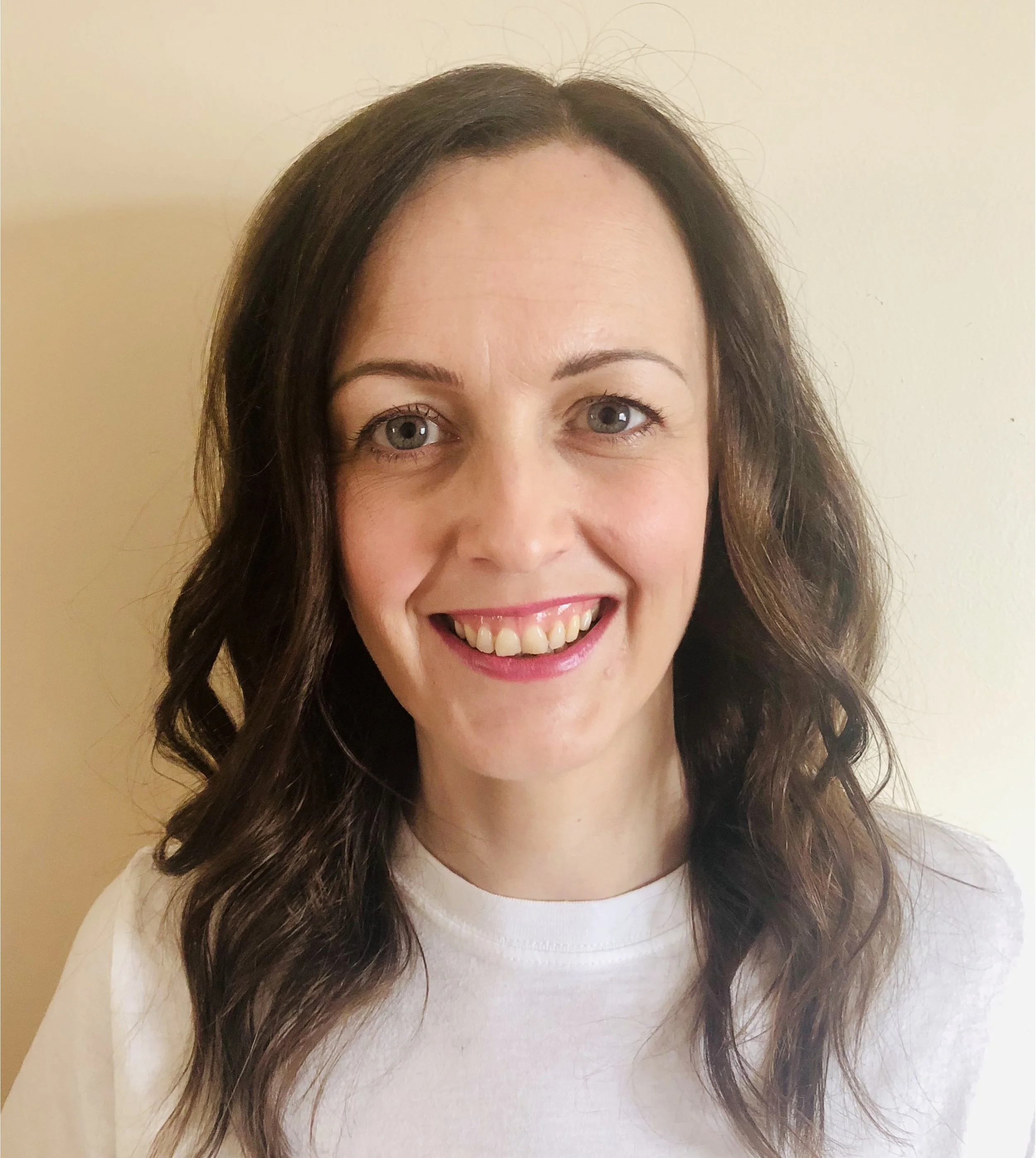 Emma smiling at the camera.