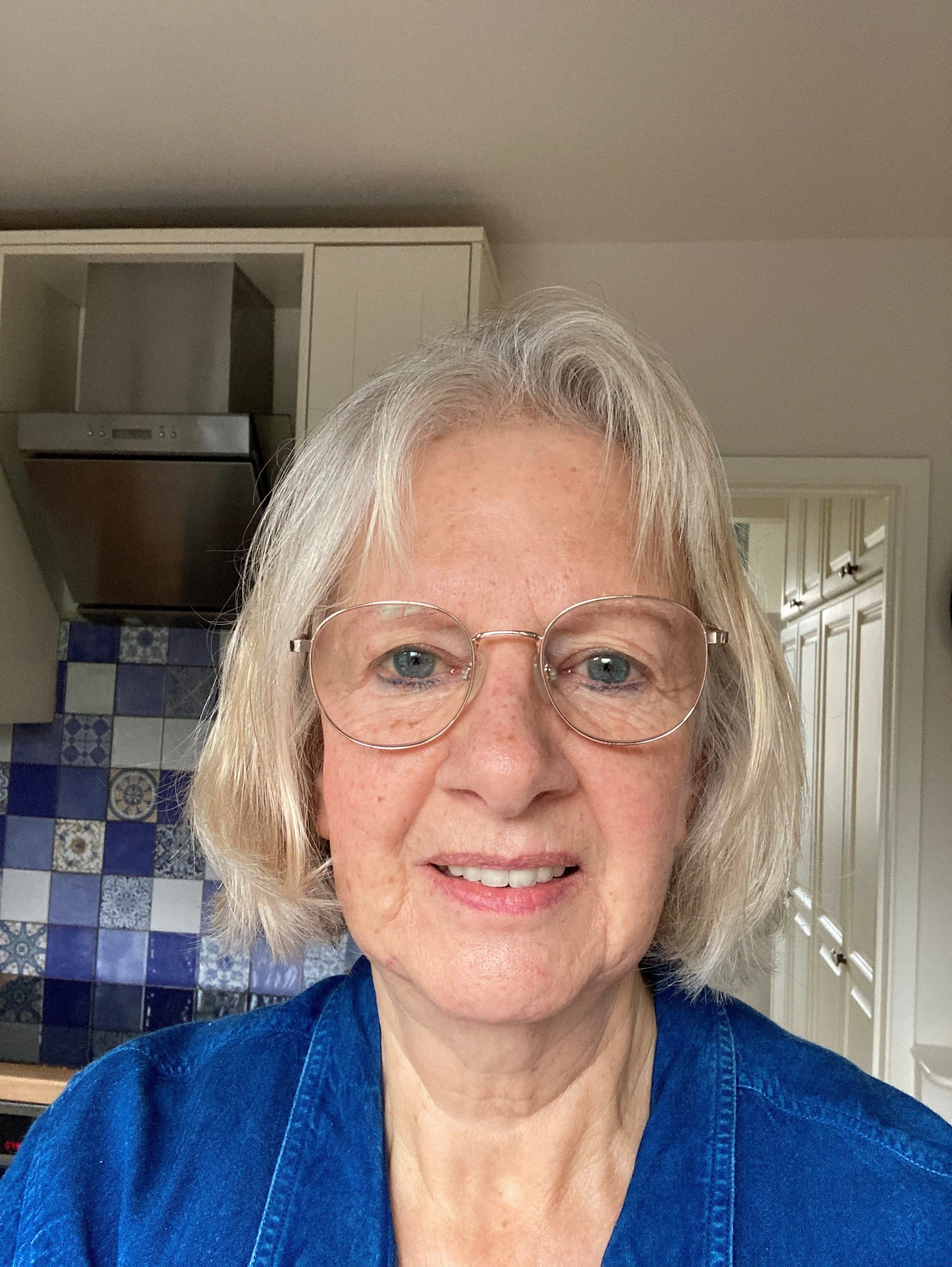 Kirsty smiling at the camera.