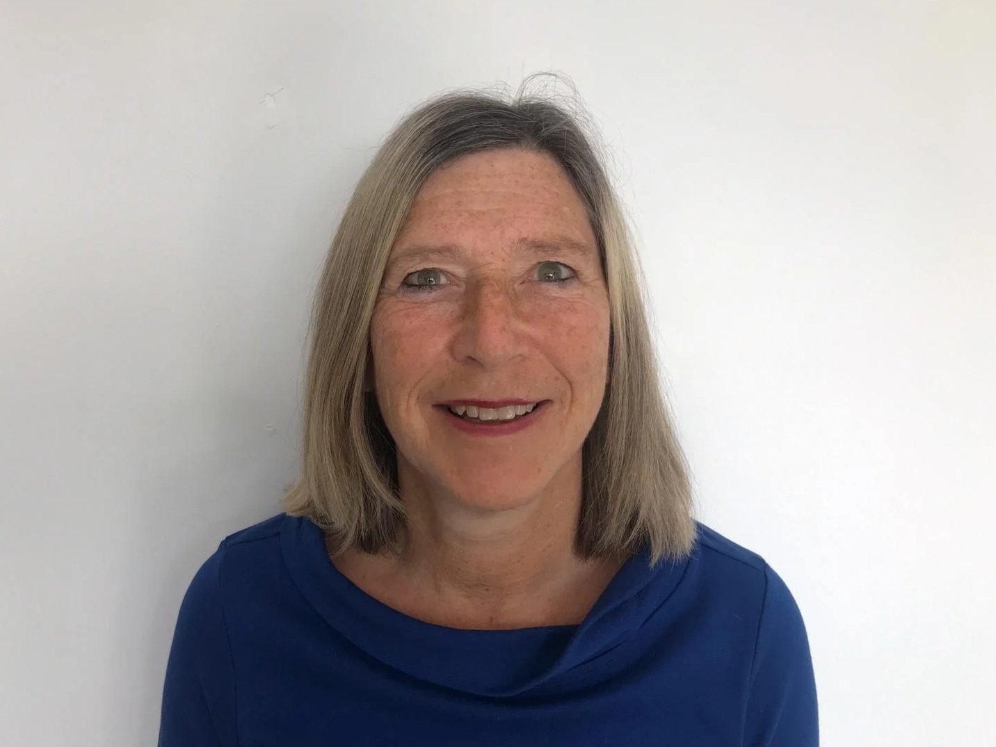 Helen smiling at the camera.