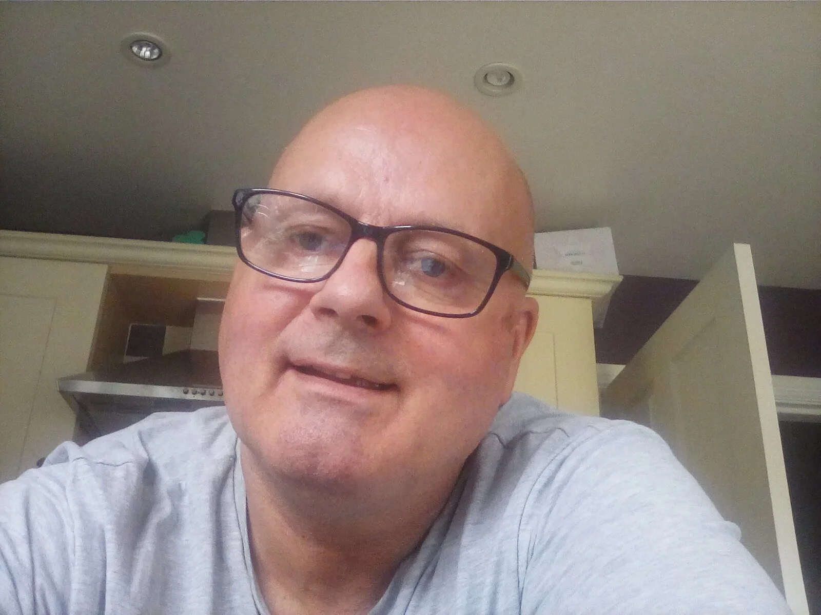 Chris smiling at the camera.