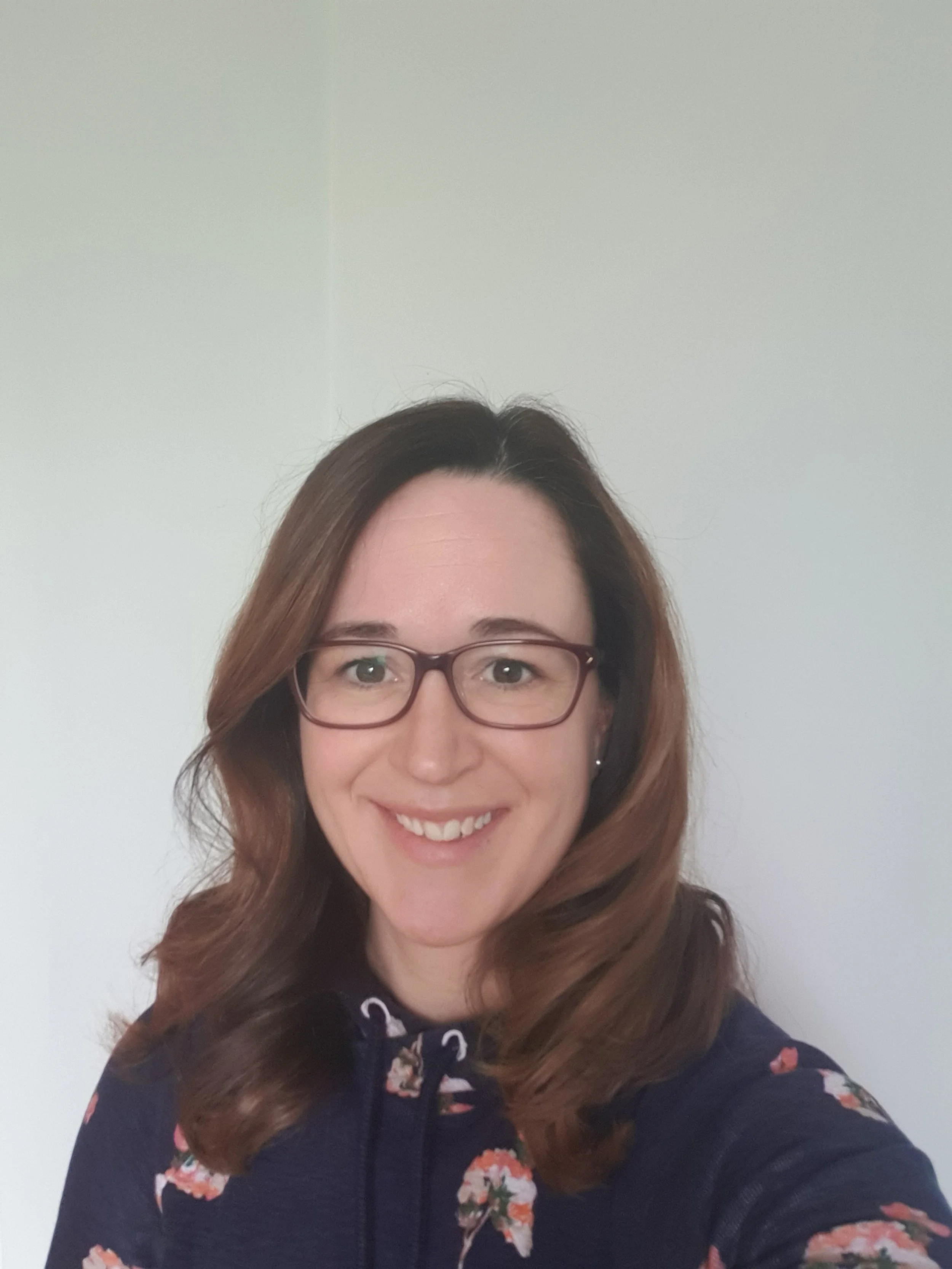 Emily smiling at the camera.