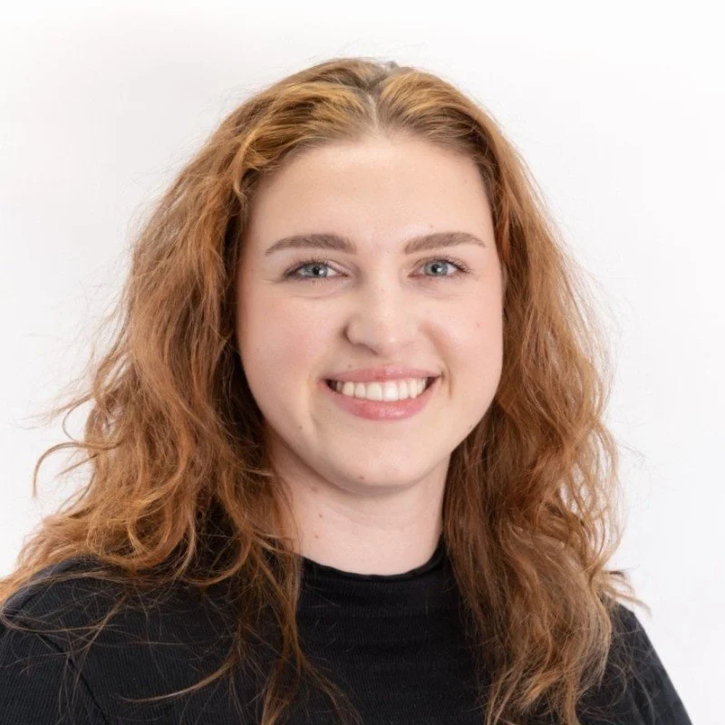 Paula smiling at the camera.