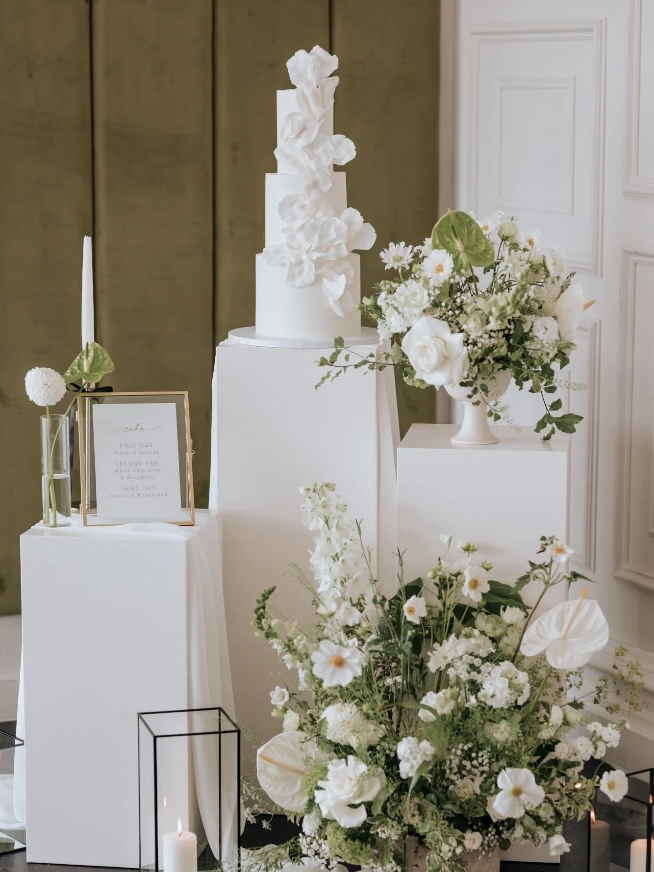 The cake had its own fabulous stage at Melissa &amp; Rhys&rsquo;s beautiful wedding @santffraedhouse 

Three tiers of individual sugar petals on plinths styled with the most beautiful flowers, accessories &amp; signage captured by the lovely @laurena