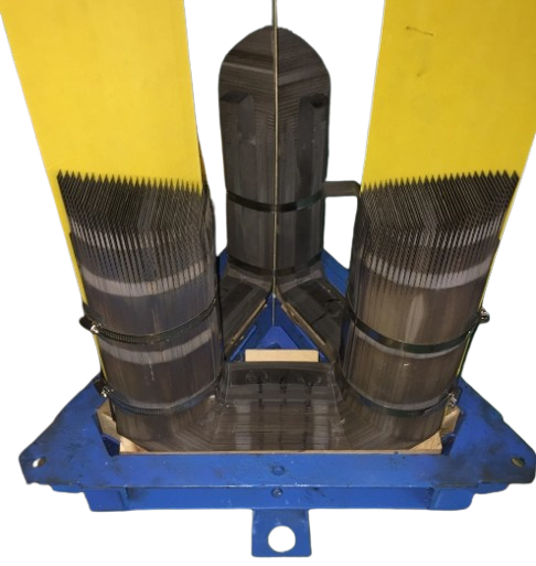 Close-up of a rocket engine nozzle with a yellow heat shield and a blue base.