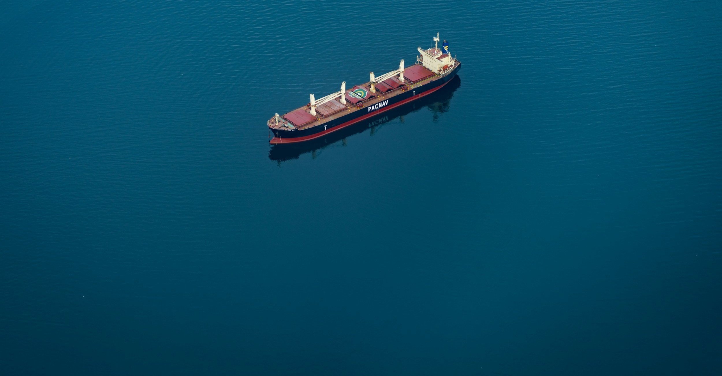 Container Ship on Royal Blue sea