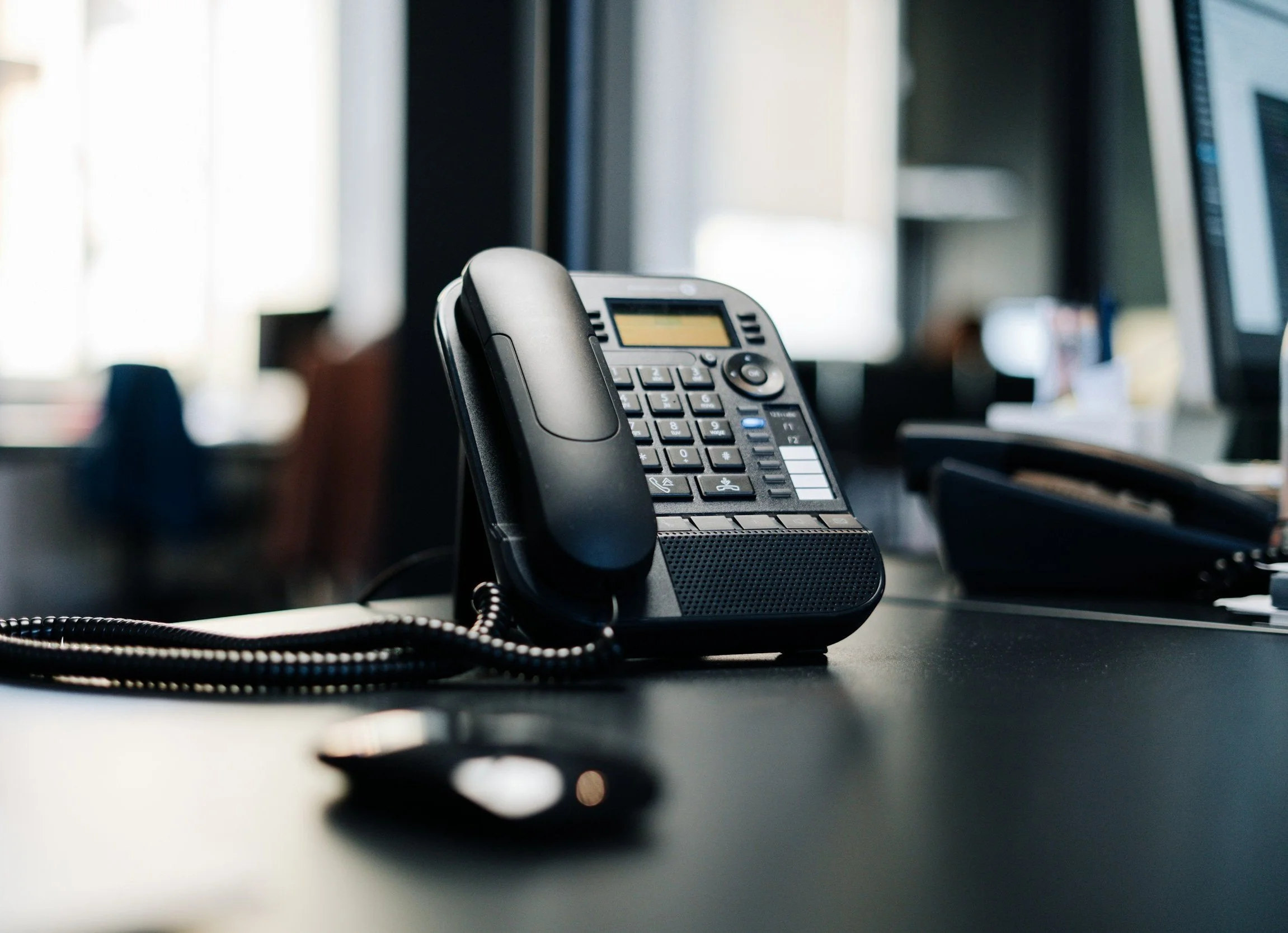 Customer support phone on a desk