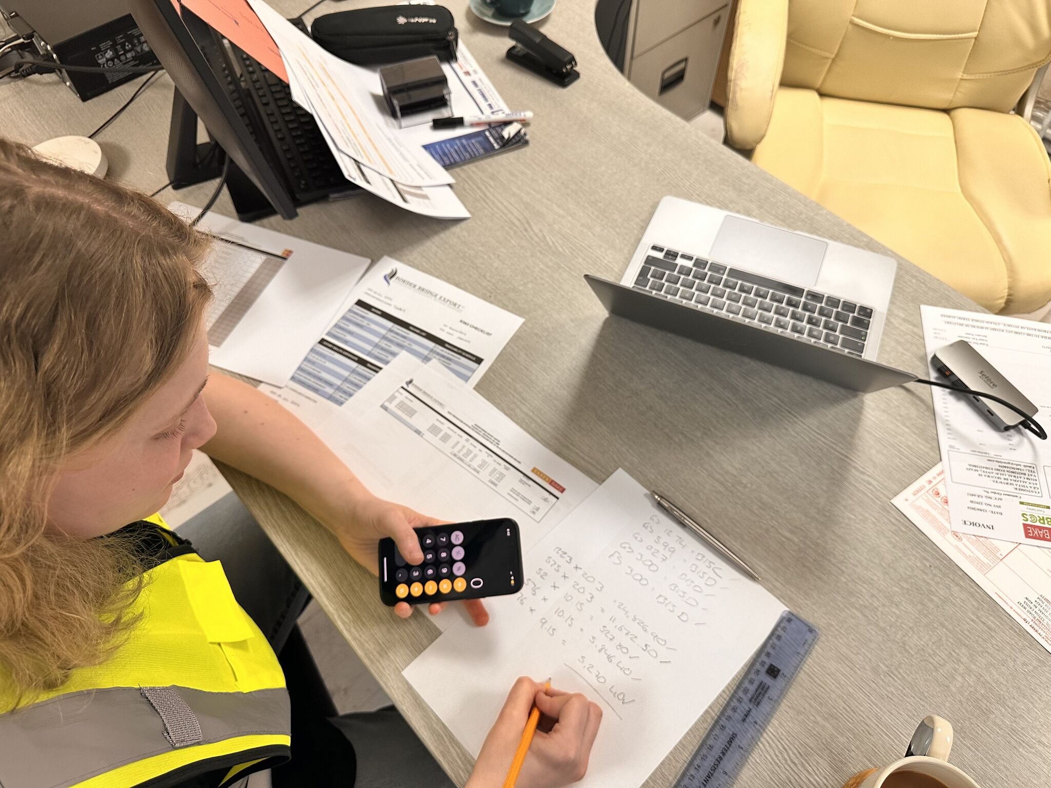 Border Bridge Export Team Working on documents