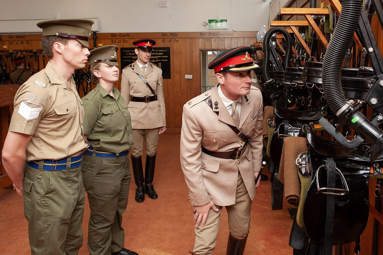 Major Cross, the Commanding Officer, inspects the tack of the King's Troop horses 