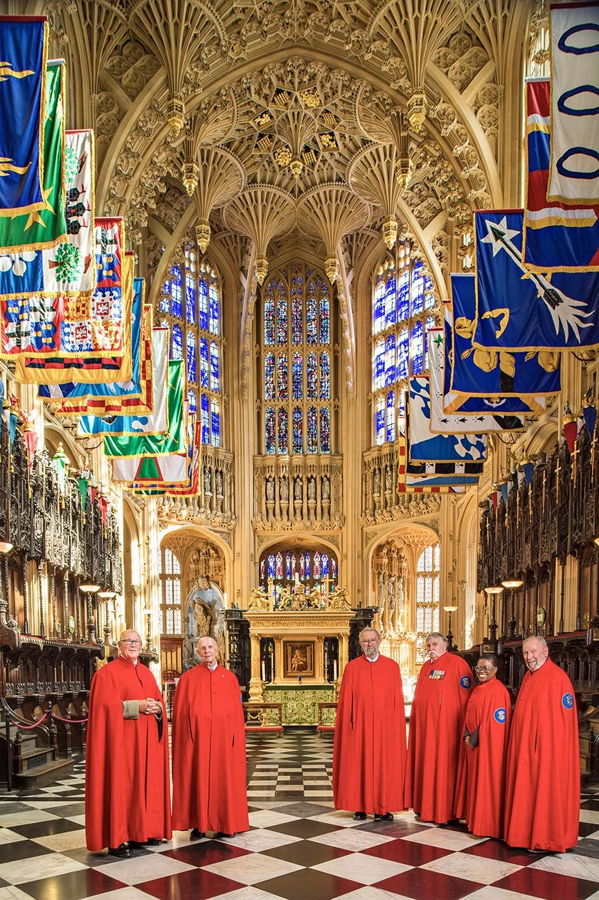 The Queen's Almsmen. They are based in Westminster Abbey and were established by King Henry Vll