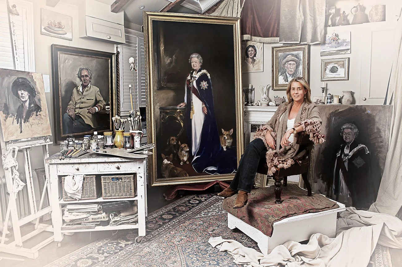 Nicky Philips in her studio with her portrait of Queen Elizabeth II
