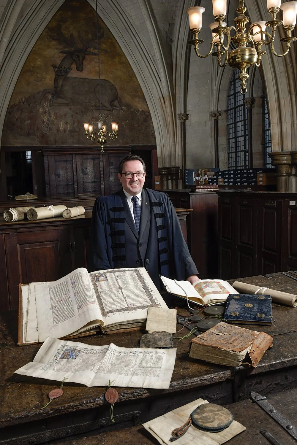The Keeper of the Muniments, Dr Matthew Payne, in the library high above the choir in Westminster Abbey