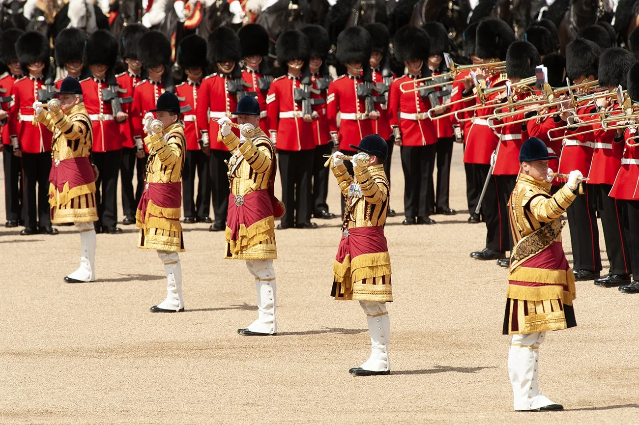The Senior Drum Major awaits a signal from the Garrison Sergeant Major for the bandit stop playing