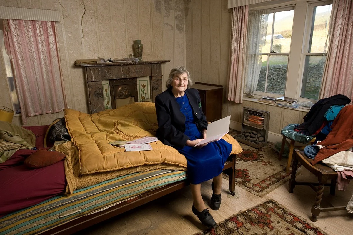 Hilda Critchlow, Derbyshire farmer's daughter, reading birthday greetings on her 80th birthday