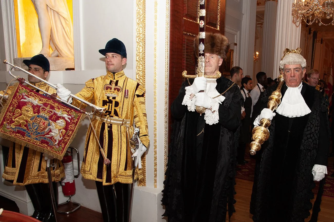 The State Trumpeters and the Pearl Sword and Mace lead the Lord Mayor and the guest of honour into dinner