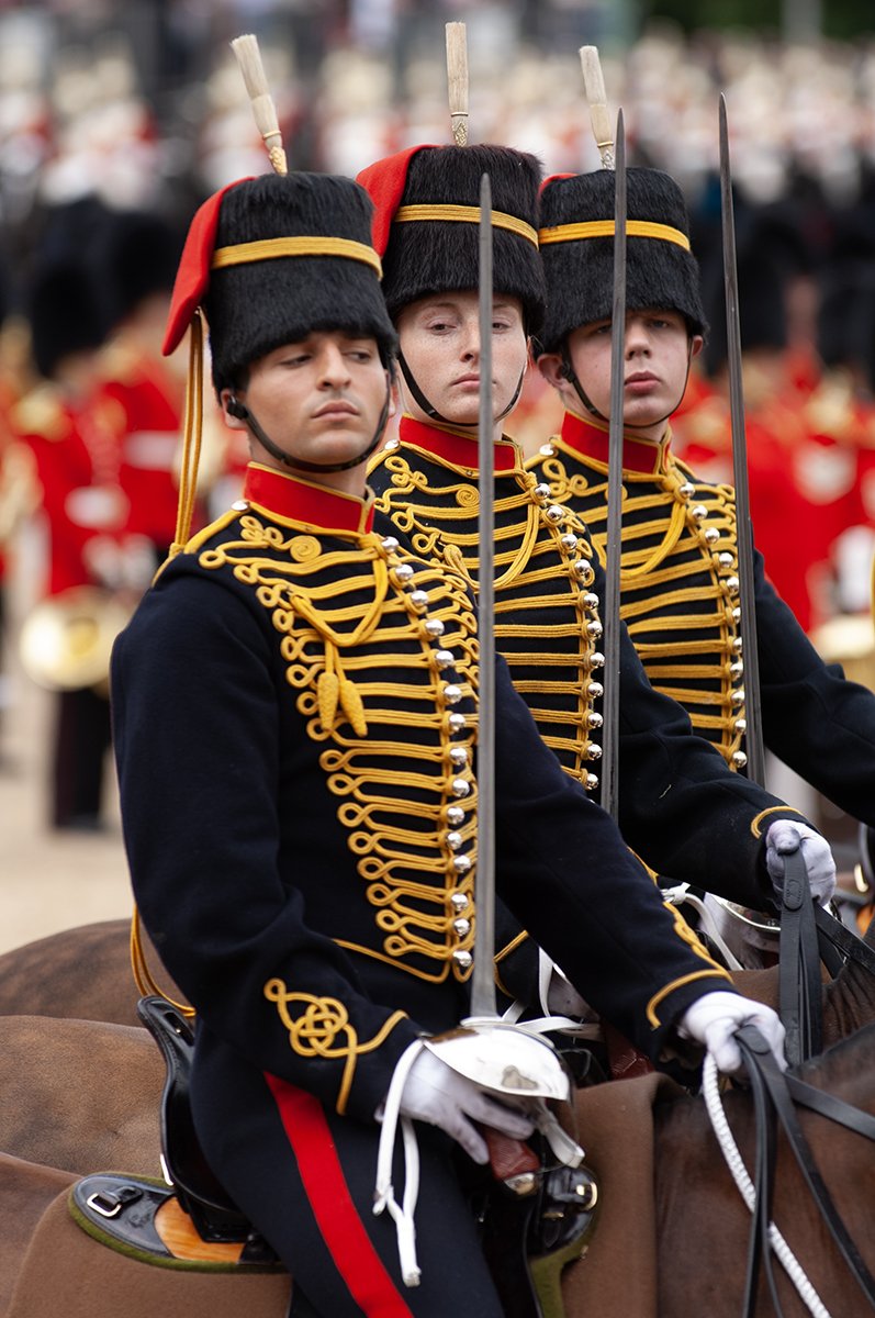 Troopers give 'Eyes Right!' salute to Her Majesty