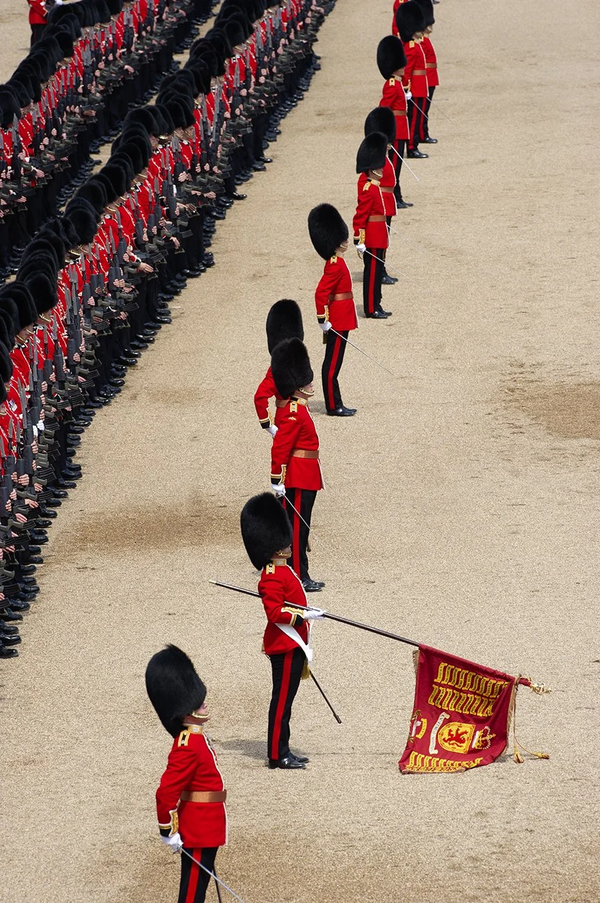 The Ensign lowers the Colour as the National Anthem is played
