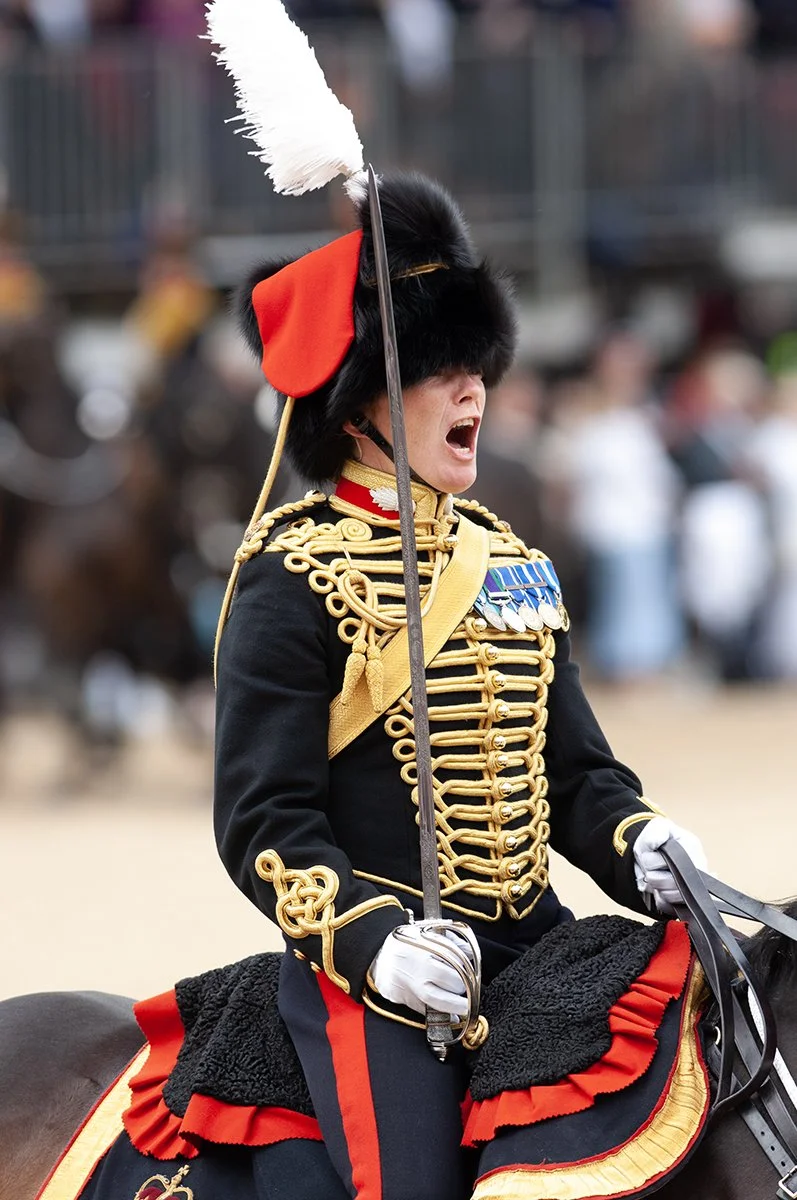 Major Erica Bridge, Commanding Officer of the King's Troop, gives the command  'Eyes Right!' as the troop file past Her Majesty