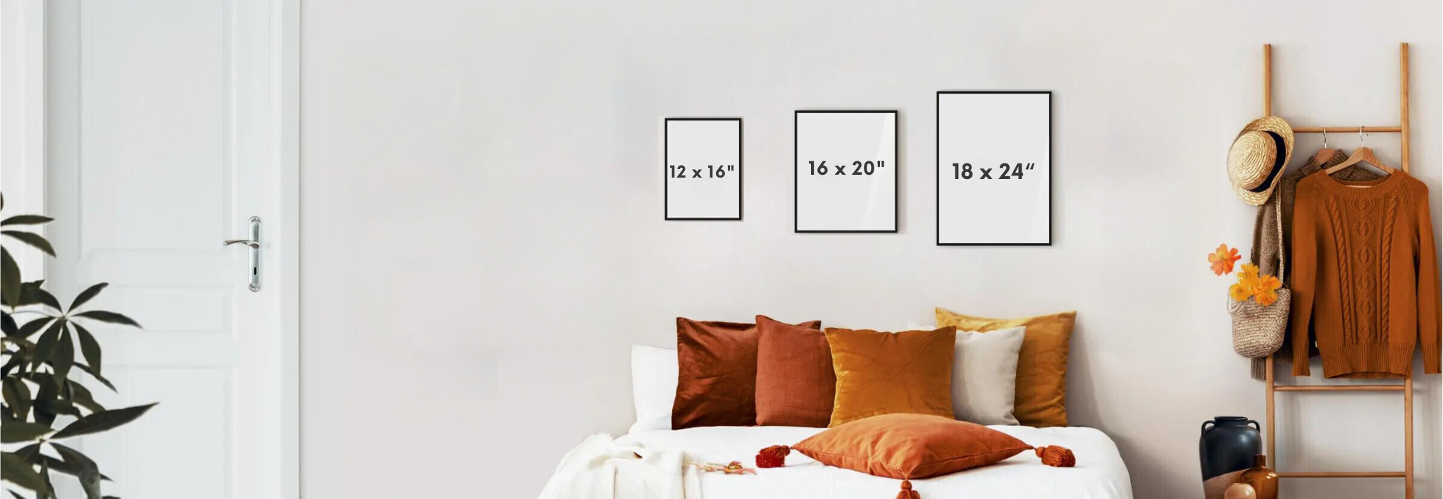 12x16, 16x20 and 18x24 inch frames side by side above a bed
