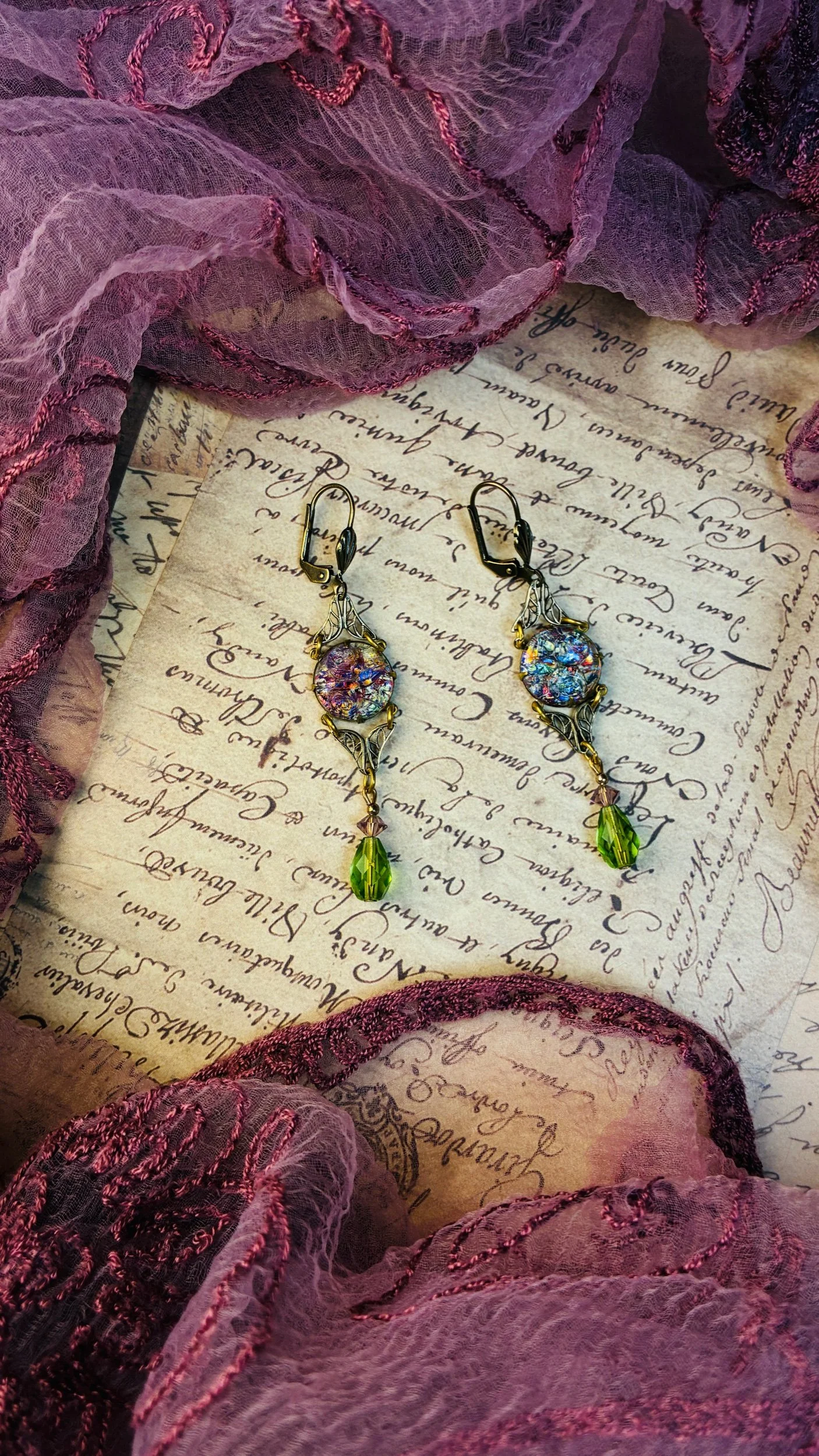 Velvet Reverie Art Deco earrings with antiqued brass details and purple vintage fabric.