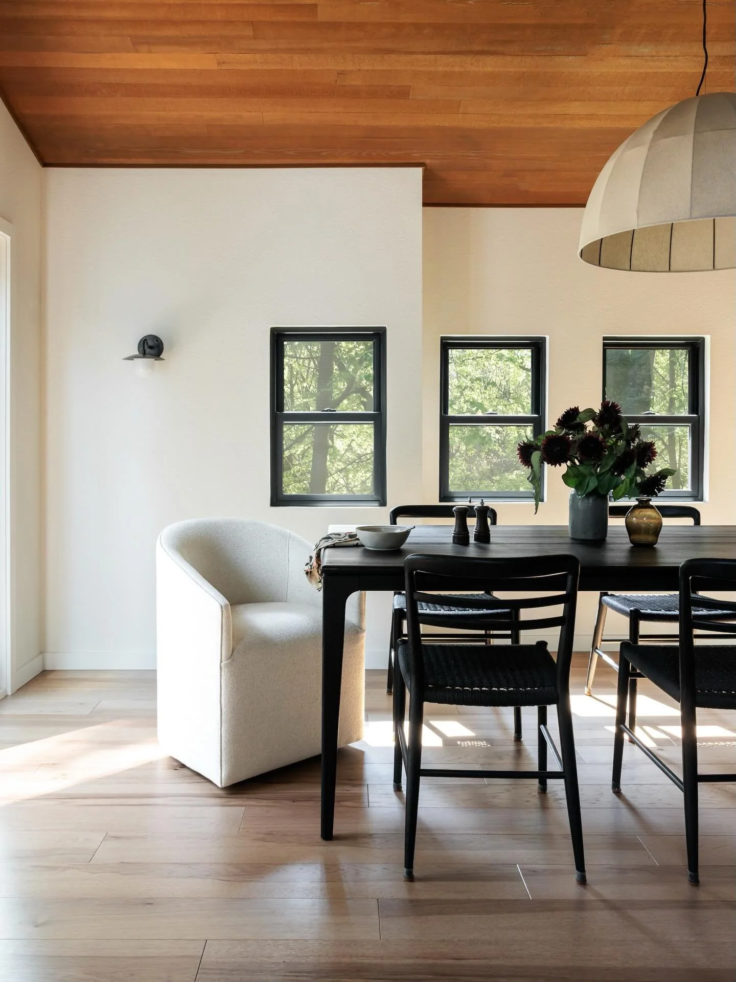 before and after ✨ impossible to tell these photos were taken from the same spot, but I promise they were! We ripped out the old cabinetry, brought the ceiling up to follow the vaulted roofline, and added windows and some beautiful French doors that 