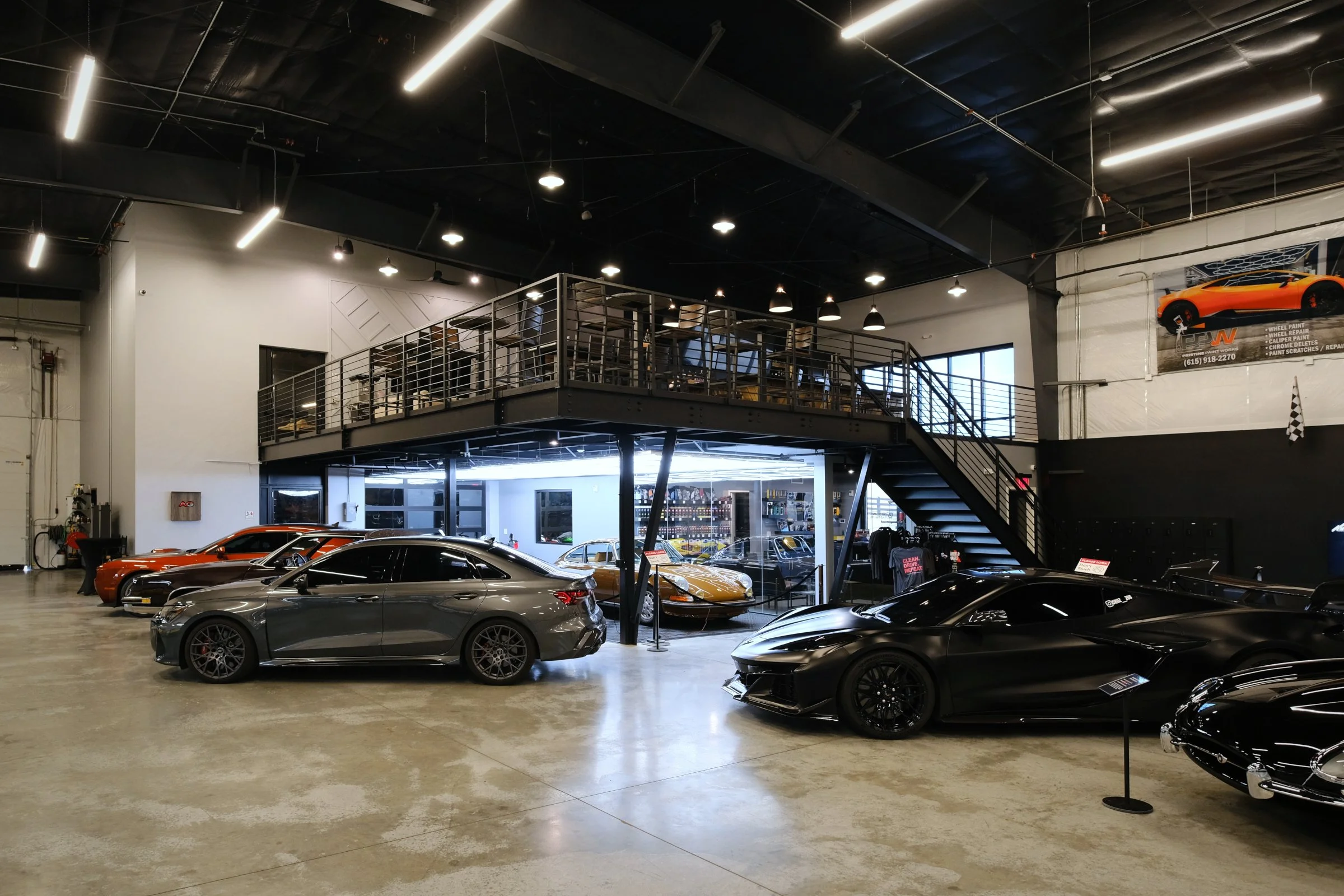 The Auto Vault Garage is a state-of-the-art car club, a first of its kind in Nashville, Tennessee. Inside, members can have their prized possessions detailed while enjoying the mezzanine lounge. The Auto Vault Garage by Gant Architectural Studio. Wil