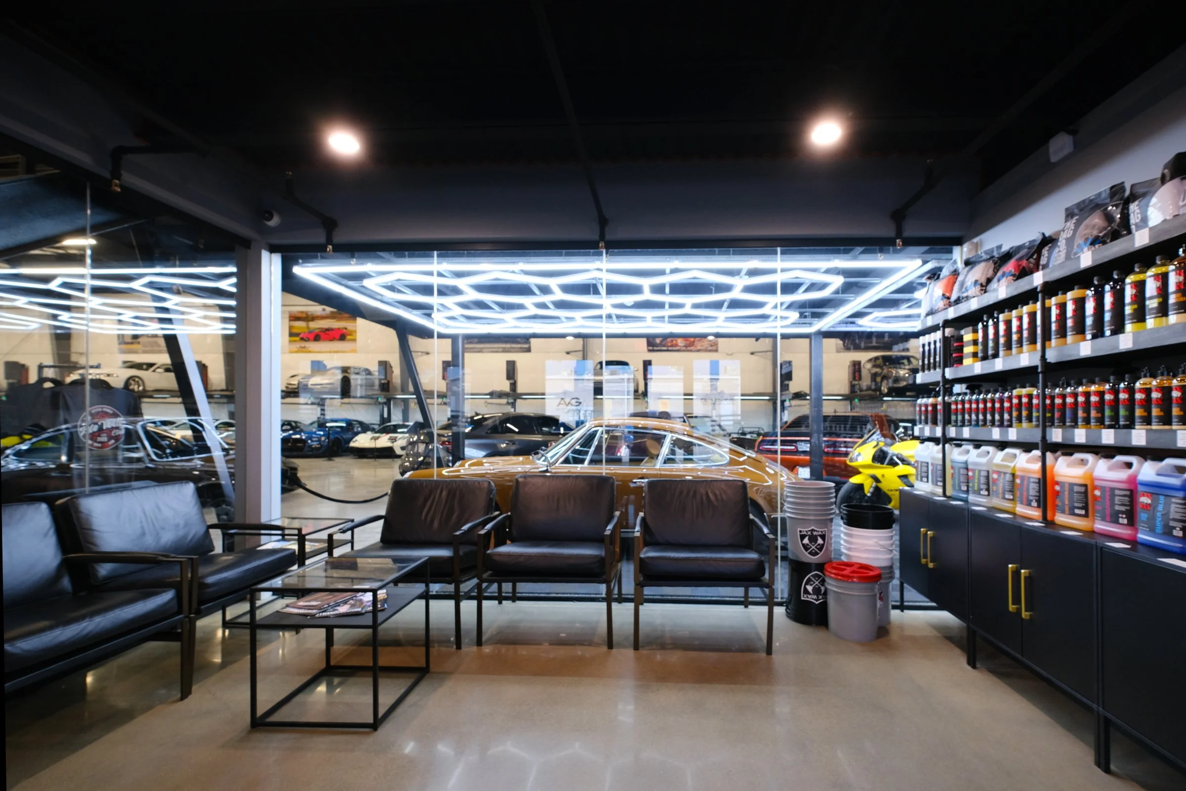 The Auto Vault Garage is a state-of-the-art car club, a first of its kind in Nashville, Tennessee. Inside, members can have their prized possessions detailed while enjoying the mezzanine lounge. The Auto Vault Garage by Gant Architectural Studio. Wil