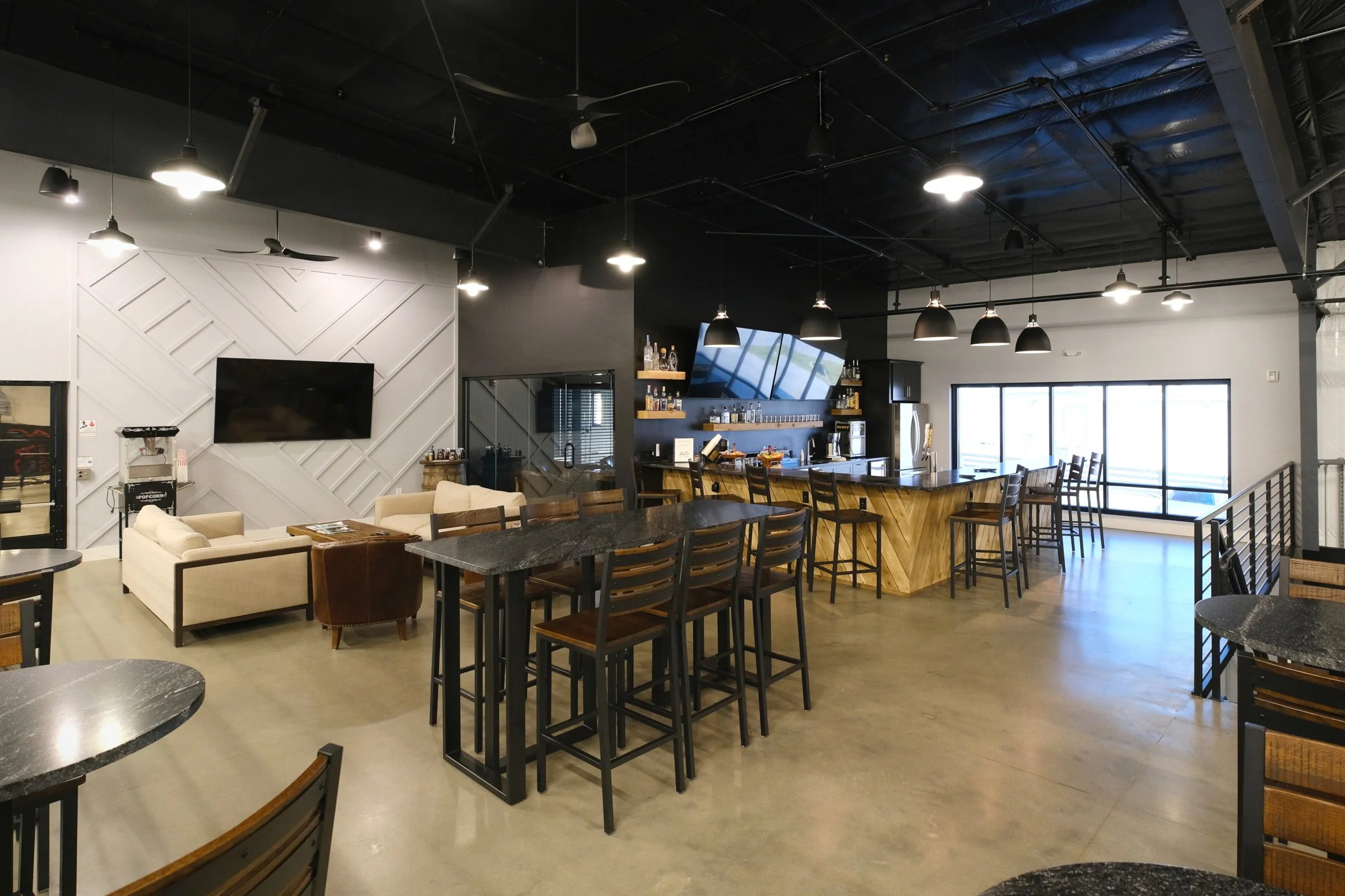 The Auto Vault Garage is a state-of-the-art car club, a first of its kind in Nashville, Tennessee. Inside, members can have their prized possessions detailed while enjoying the mezzanine lounge. The Auto Vault Garage by Gant Architectural Studio. Wil