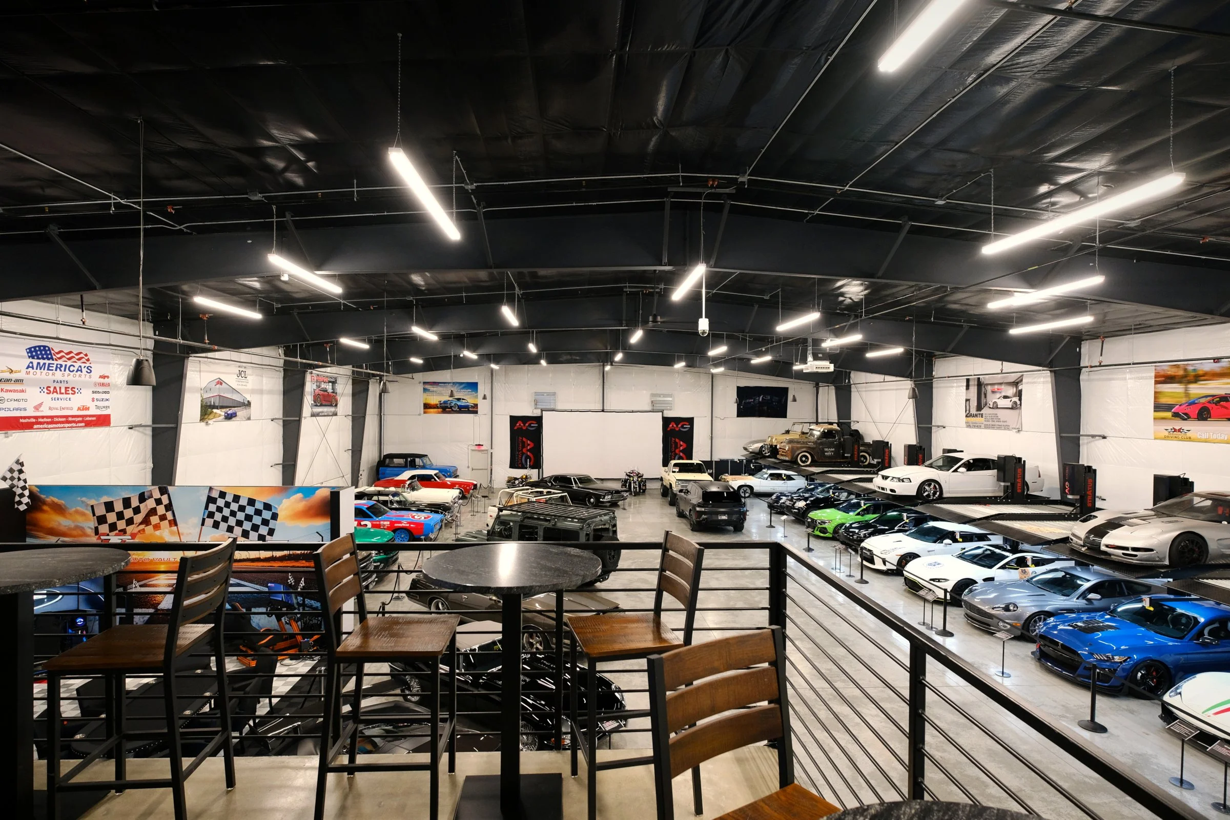 The Auto Vault Garage is a state-of-the-art car club, a first of its kind in Nashville, Tennessee. Inside, members can have their prized possessions detailed while enjoying the mezzanine lounge. The Auto Vault Garage by Gant Architectural Studio. Wil