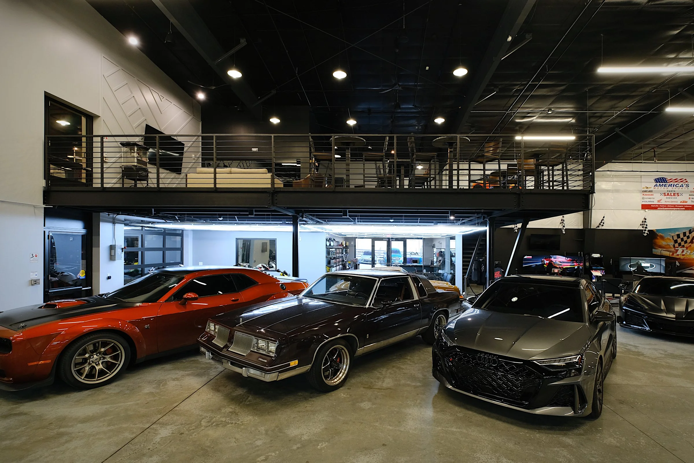 The Auto Vault Garage is a state-of-the-art car club, a first of its kind in Nashville, Tennessee. Inside, members can have their prized possessions detailed while enjoying the mezzanine lounge. The Auto Vault Garage by Gant Architectural Studio. Wil