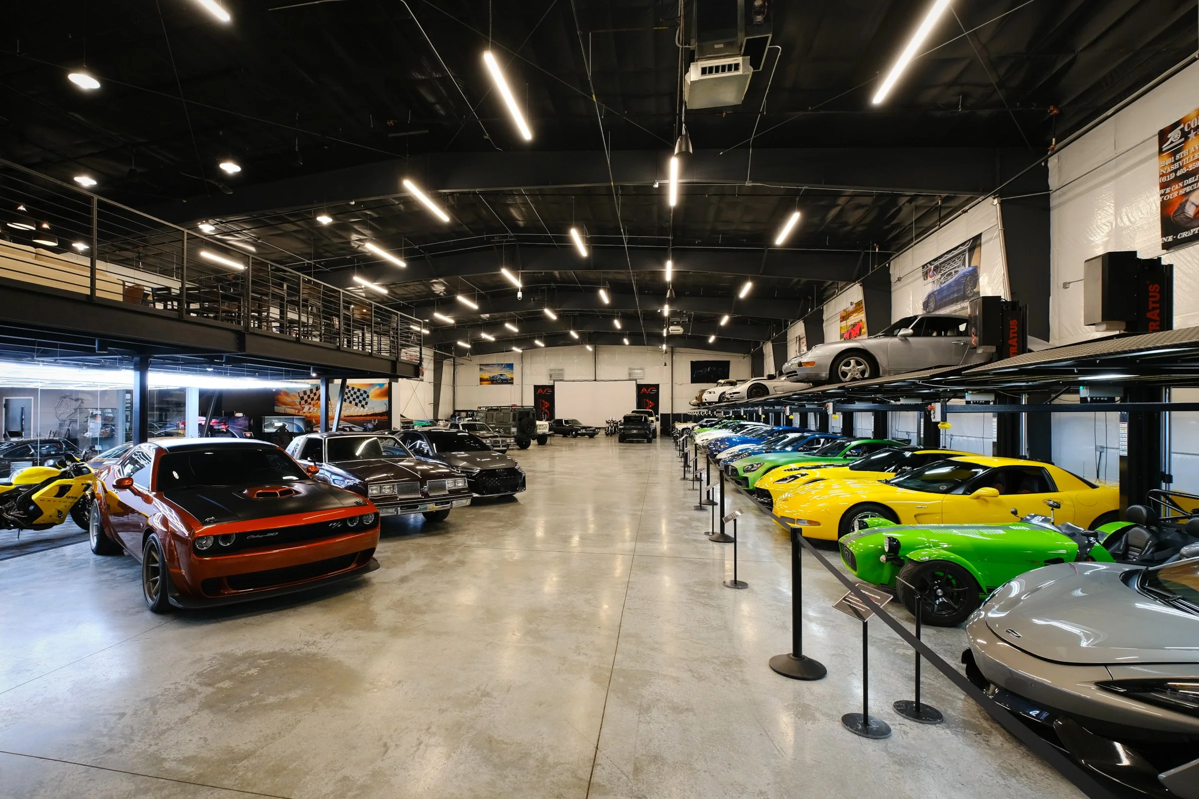 The Auto Vault Garage is a state-of-the-art car club, a first of its kind in Nashville, Tennessee. Inside, members can have their prized possessions detailed while enjoying the mezzanine lounge. The Auto Vault Garage by Gant Architectural Studio. Wil