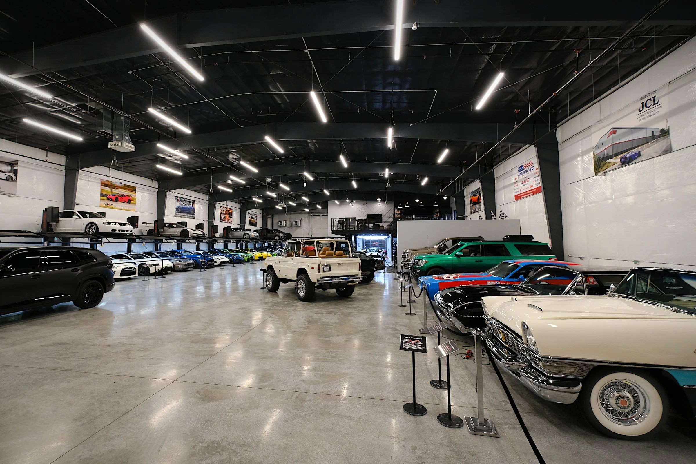 The Auto Vault Garage is a state-of-the-art car club, a first of its kind in Nashville, Tennessee. Inside, members can have their prized possessions detailed while enjoying the mezzanine lounge. The Auto Vault Garage by Gant Architectural Studio. Wil