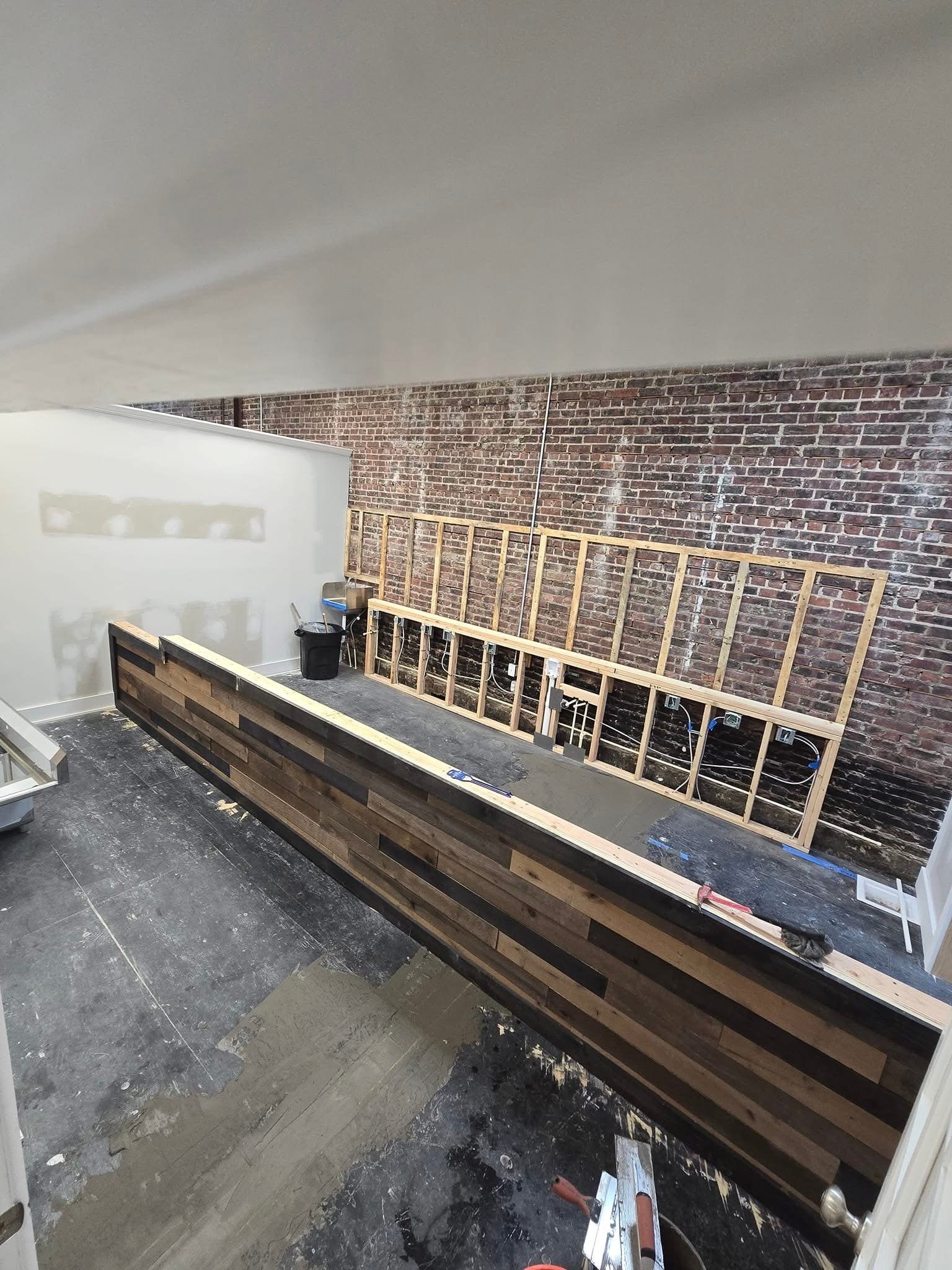 Spire Coffee Shop 
18”x 36” Floating Tile. Karndean Travertine Naturale Ceppo