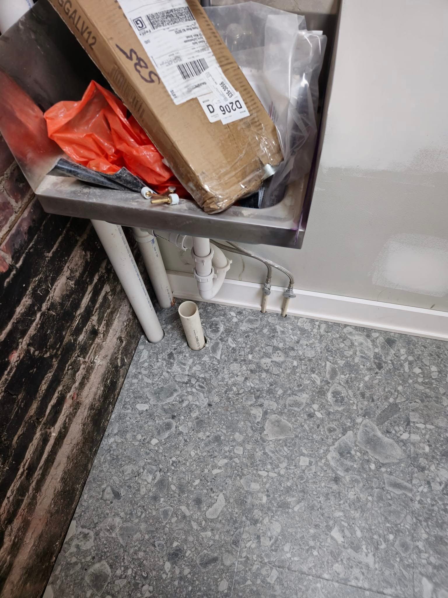 Spire Coffee Shop 
18”x 36” Floating Tile. Karndean Travertine Naturale Ceppo