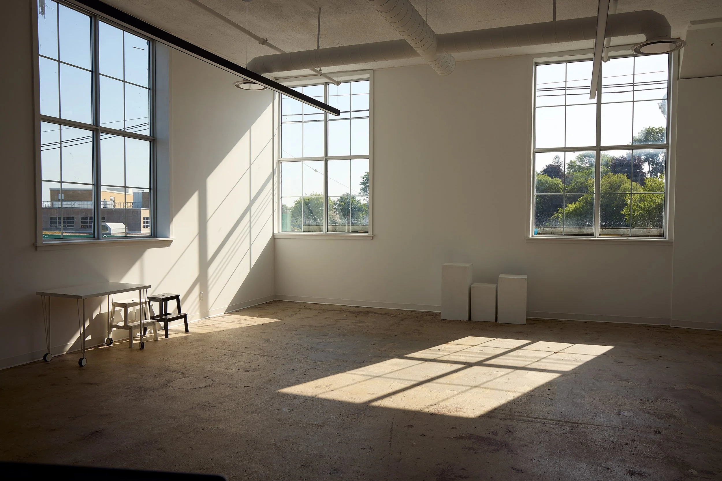 Bright, natural-light studio space inside The Pinnacle building in downtown Belleville, Ontario, where Headshots by Steph photographs individual and team headshot sessions.