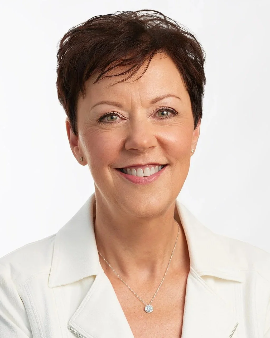Mary Joan Brinson, Owner of The Relationship Centre, smiling in a professional headshot.
