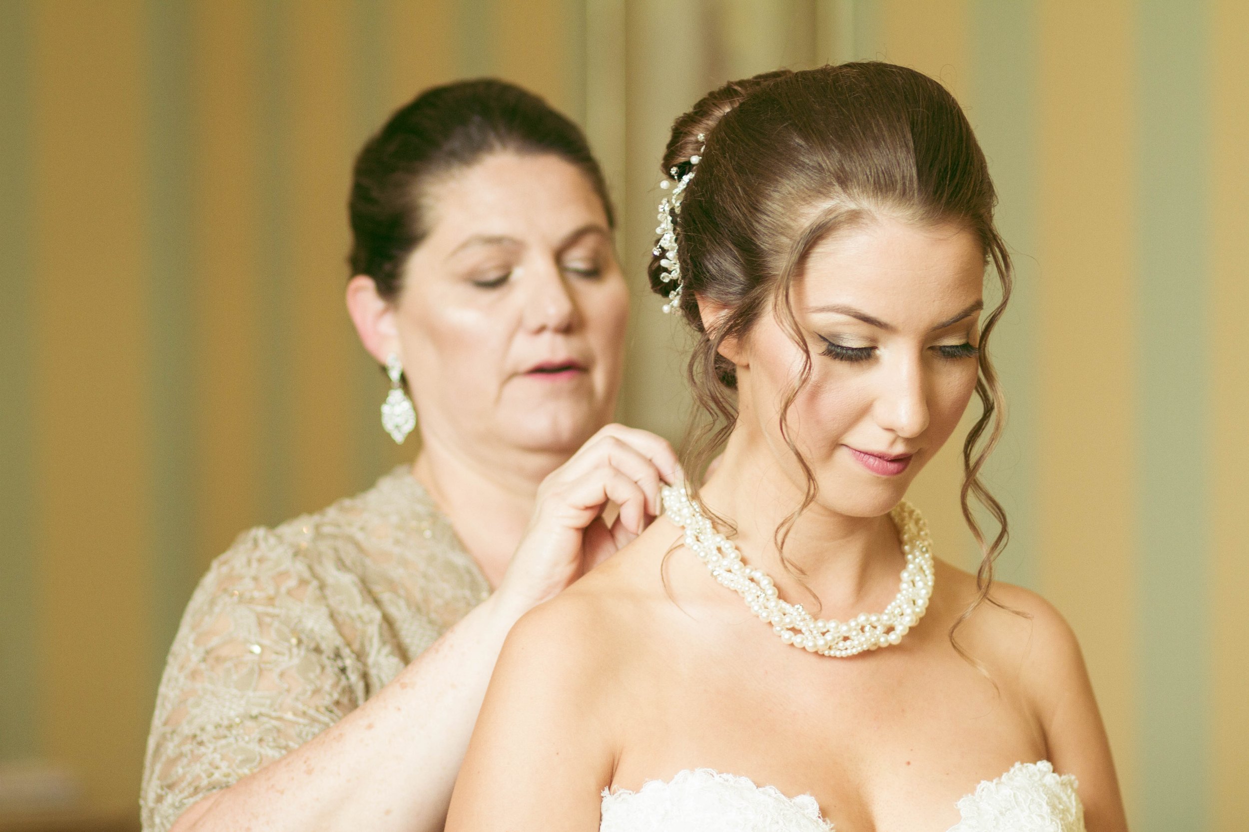 bride getting ready in her beautiful mansion. mother of the bride.