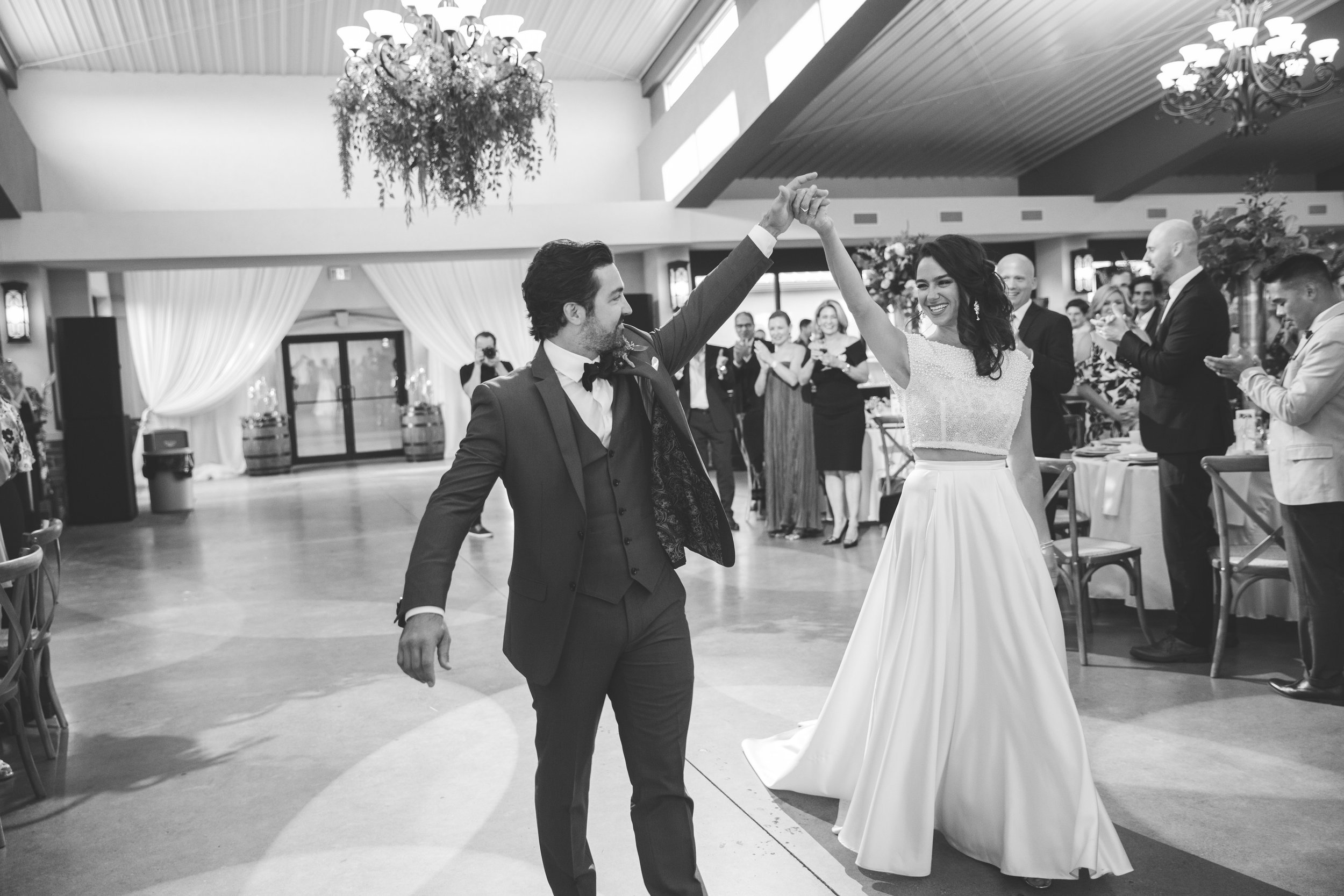 bride and groom entering their beautiful wedding
