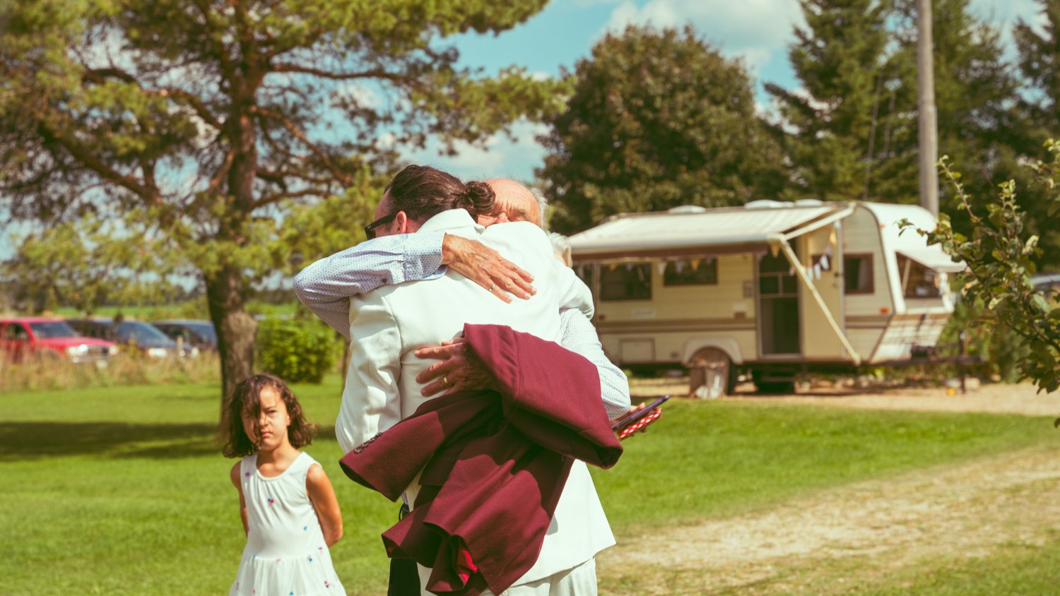 candid moment beautiful wedding hug