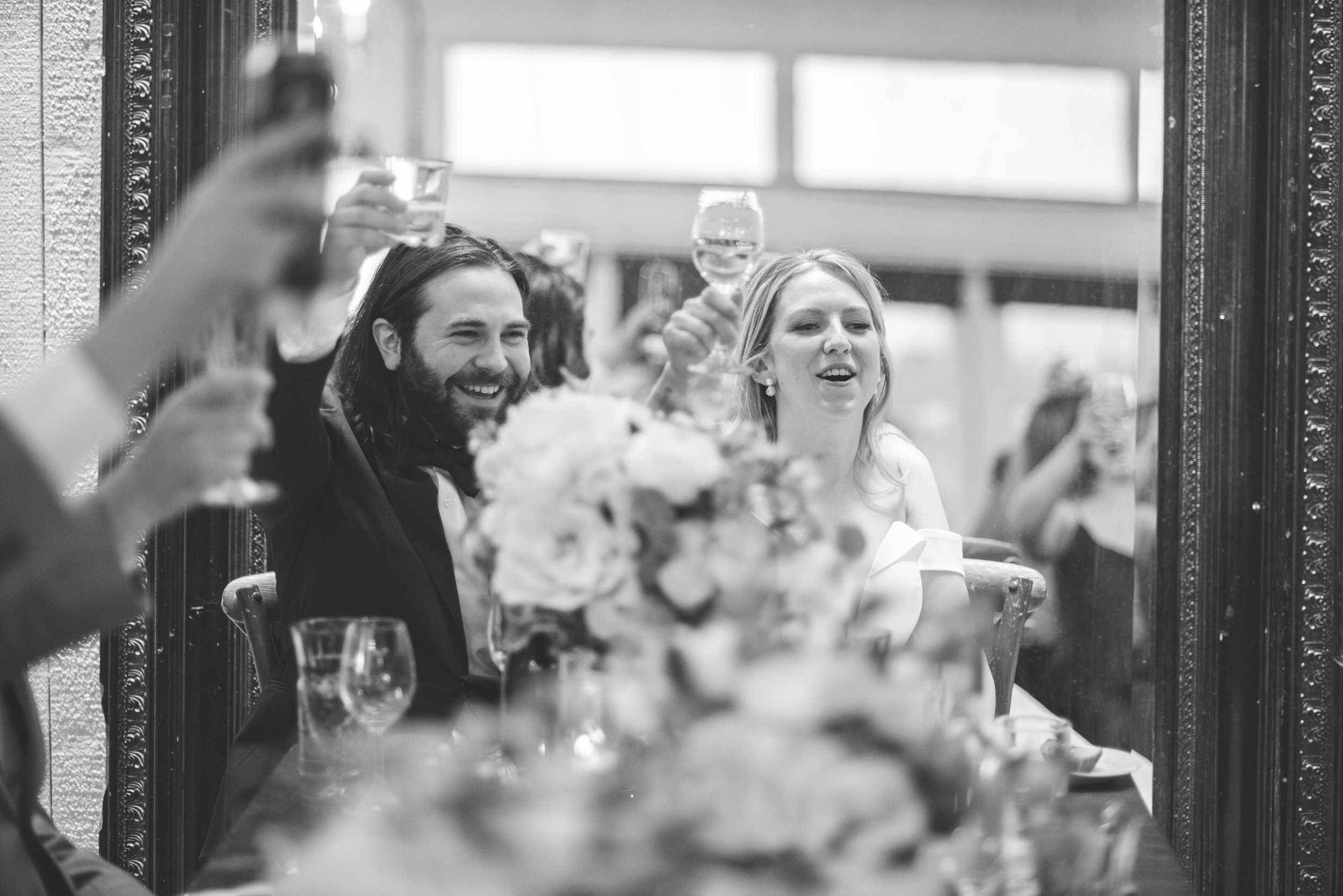 beautiful wedding reception. laughs and fun bride and groom.