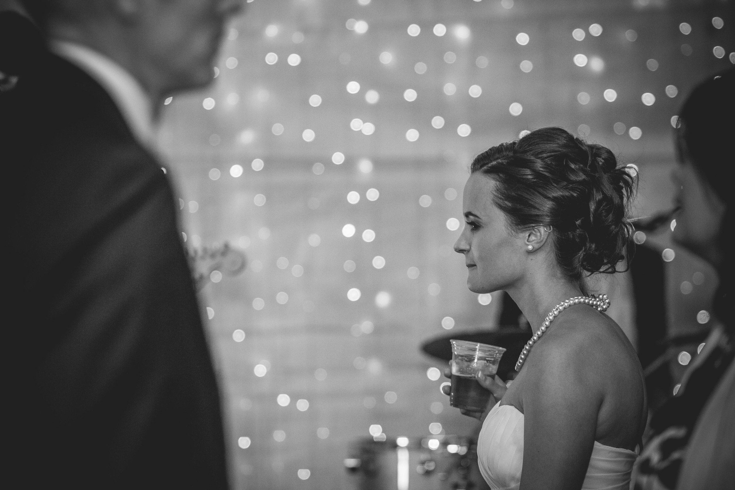 bride and groom in love taking a candid photo during their beautiful wedding first dance