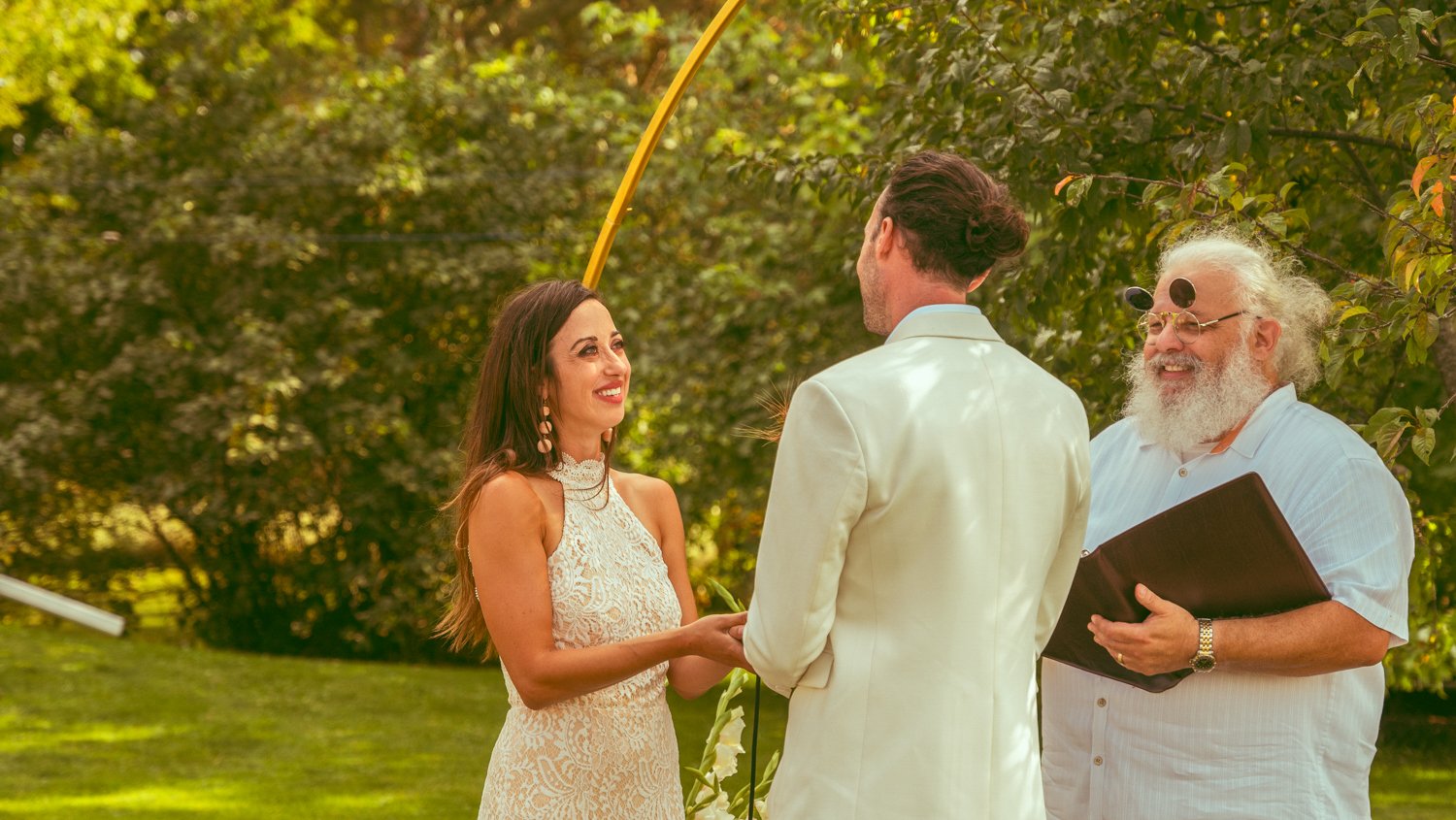bride and groom during the outdoor wedding beautiful wedding candid moment during the ceremony