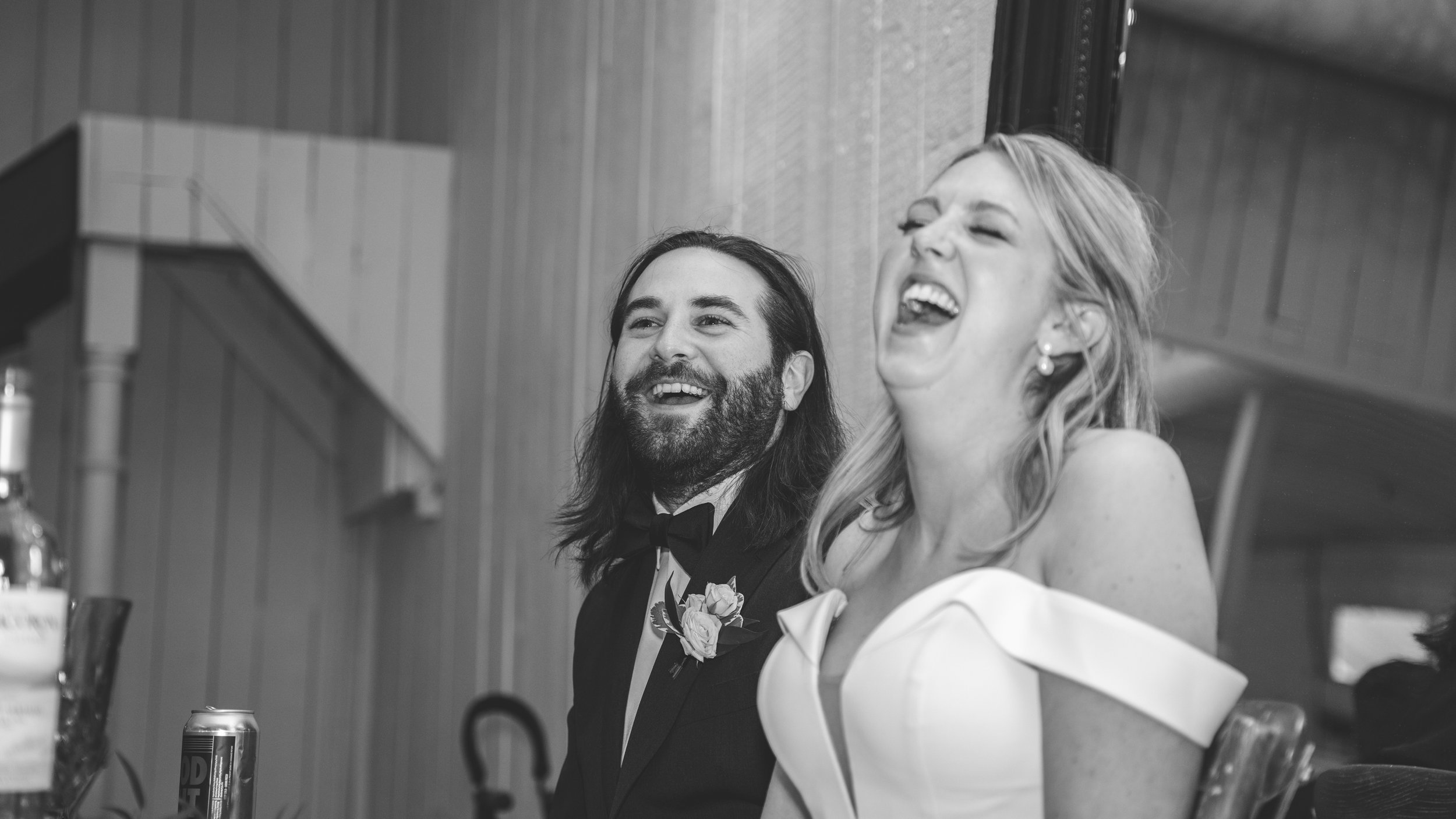 beautiful wedding reception. laughs and fun. wedding speech bride and groom in love