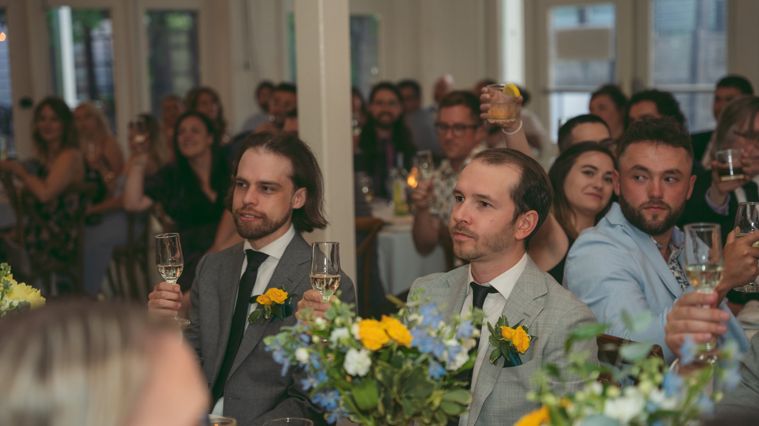 beautiful wedding reception. laughs and fun. wedding speech bride and groom in love