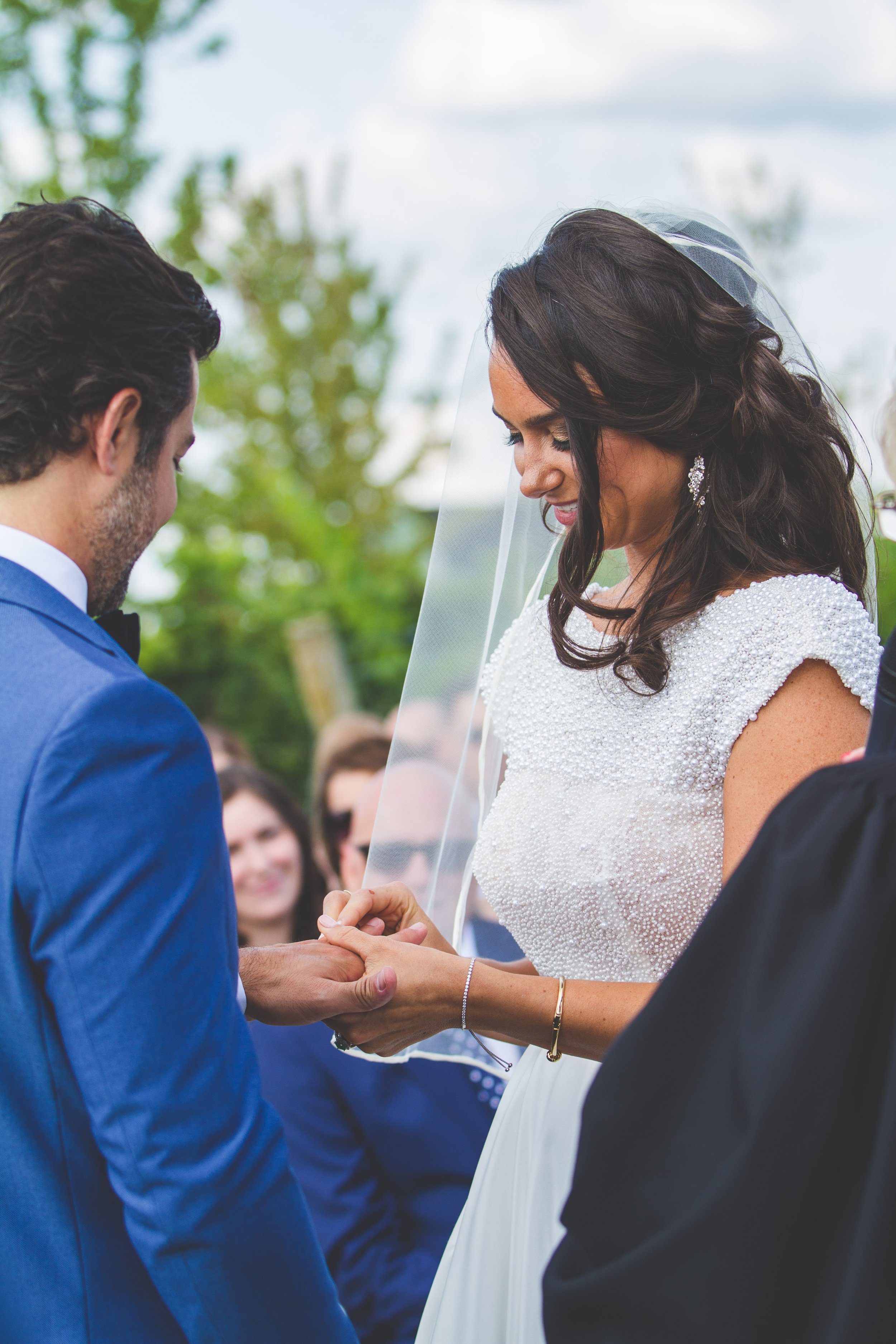 Beautiful wedding at Winery outdoor wedding exchanging the rings